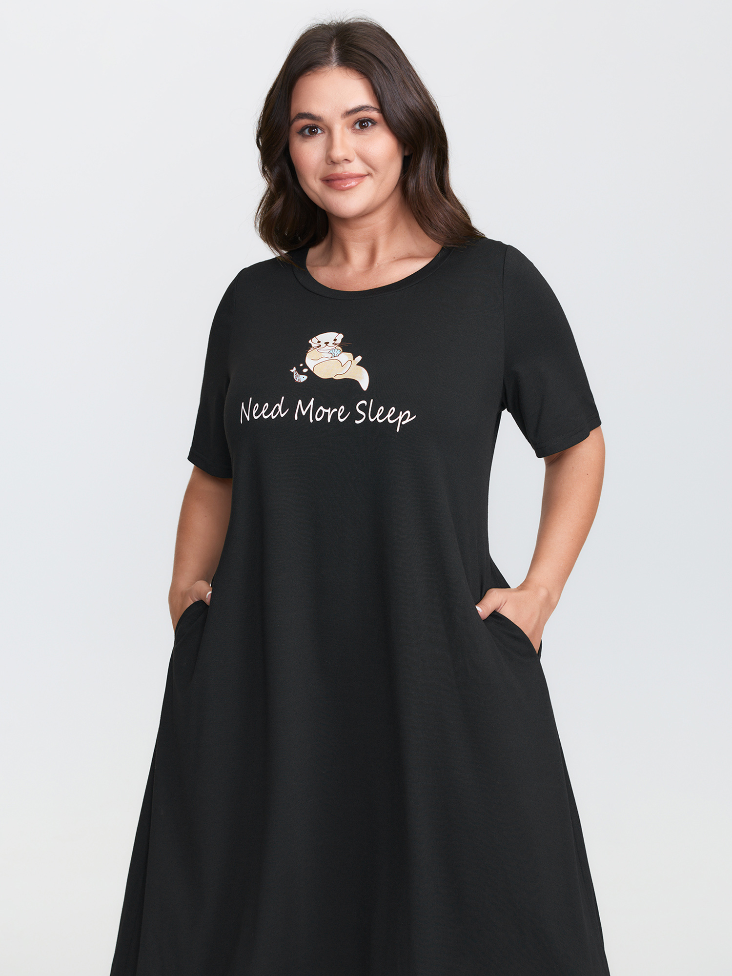 Side view of BloomChic Women's Plus Size Ultra-Comfort Stretchy Otter Print Nightgown Black Short sleeve Round Neck 10/M