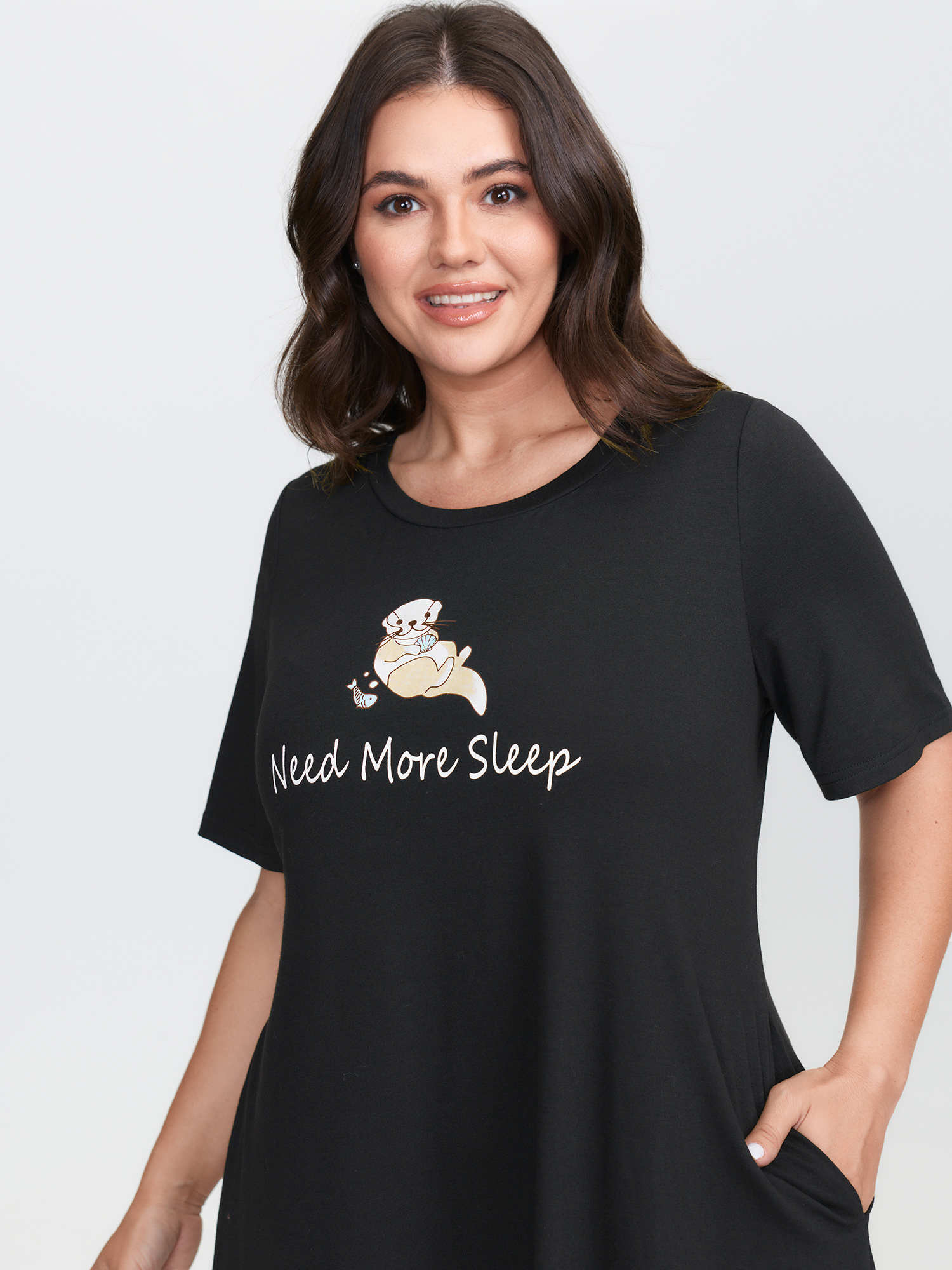 Side view of BloomChic Women's Plus Size Ultra-Comfort Stretchy Otter Print Nightgown Black Short sleeve Round Neck 10/M