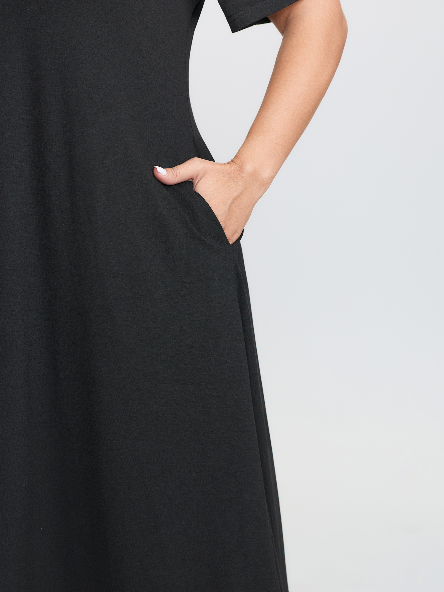 Side view of BloomChic Women's Plus Size Ultra-Comfort Stretchy Otter Print Nightgown Black Short sleeve Round Neck 10/M