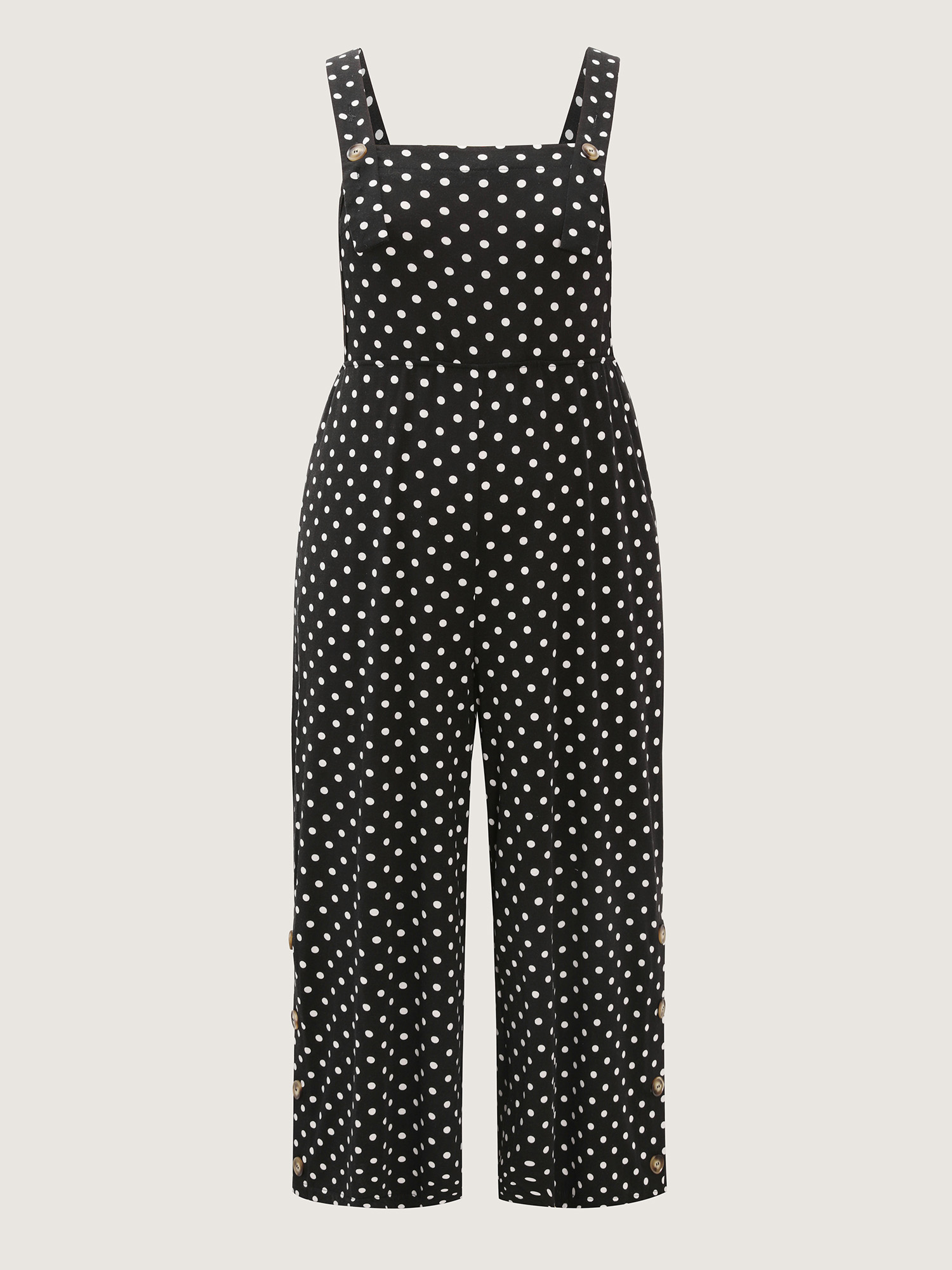 Side view of BloomChic Women's Plus Size Stretchy Polka Dots Lounge Jumpsuit Black Maxi 10/M