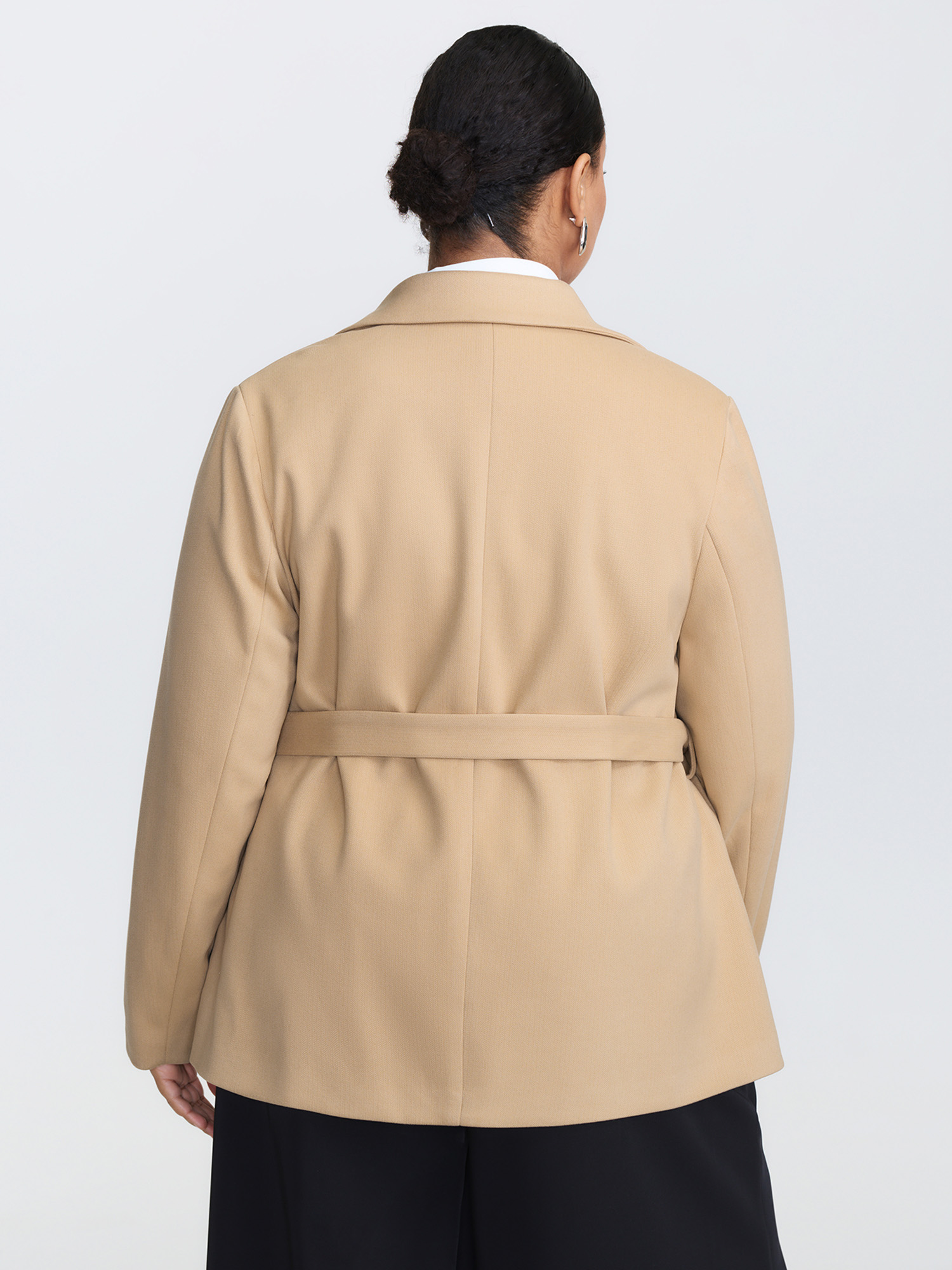 Side view of BloomChic Women's Plus Size Textured Belted Plain Blazer Tan not graphics Wide Waistband Sleeve Long Sleeve Notched Lapel 26/4X