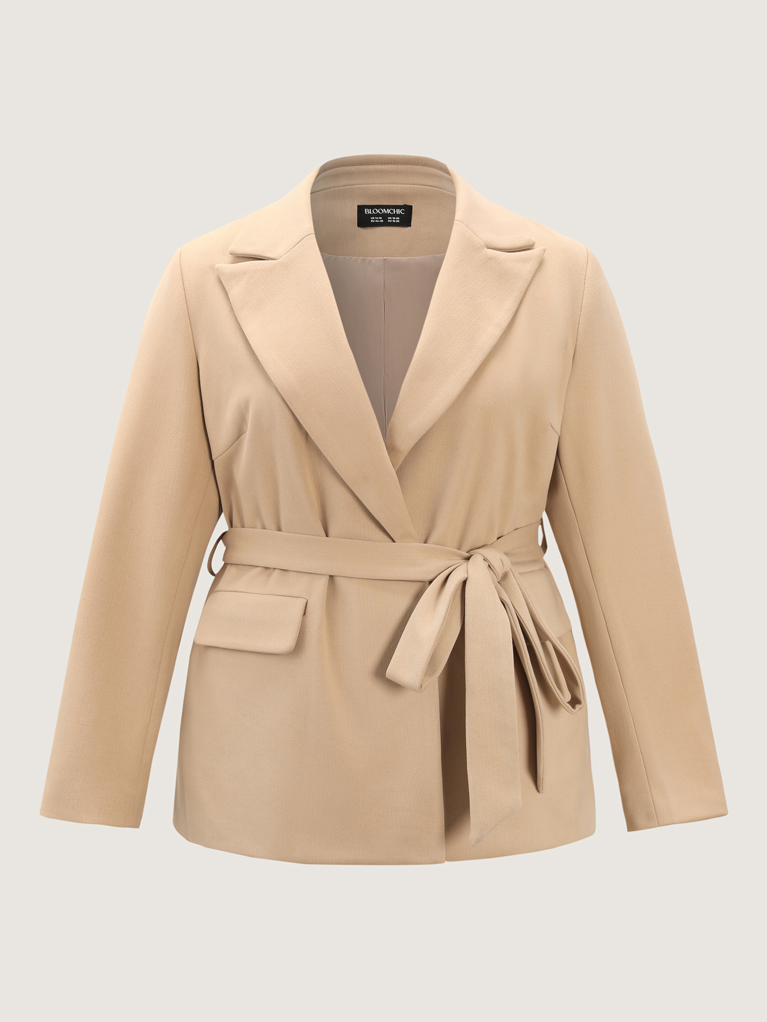 Side view of BloomChic Women's Plus Size Textured Belted Plain Blazer Tan not graphics Wide Waistband Sleeve Long Sleeve Notched Lapel 26/4X