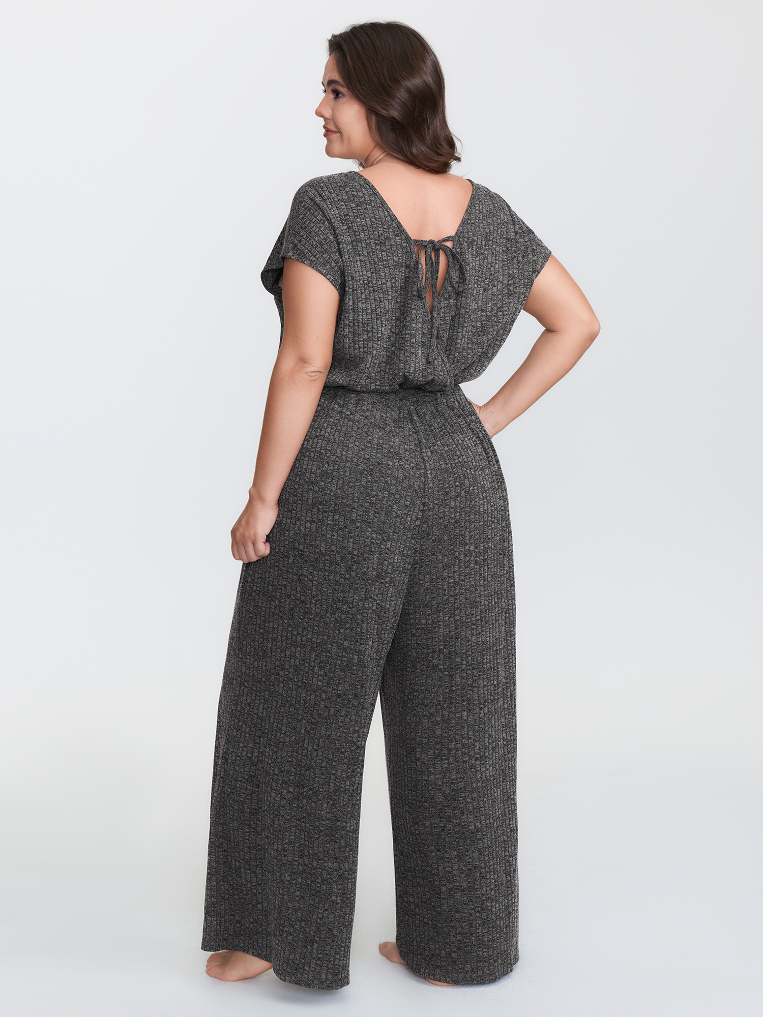 Side view of BloomChic Women's Plus Size Supersoft Ribbed Pockets Back-Tie Lounge Jumpsuit DimGray not graphics 14-16/1X