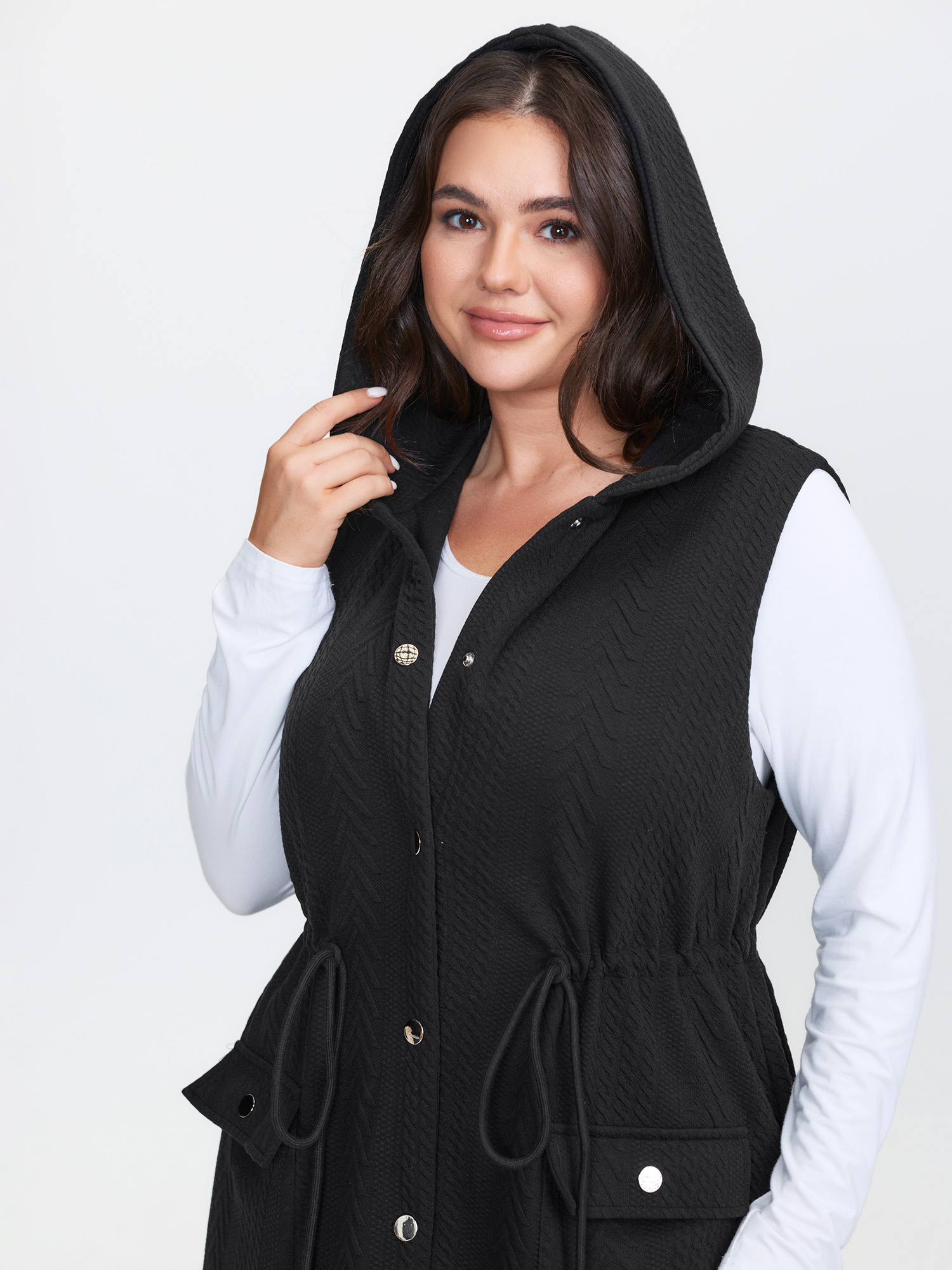 Side view of BloomChic Women's Plus Size Textured Hooded Drawstring Waist Vest Black Lace-Up 22-24/3X