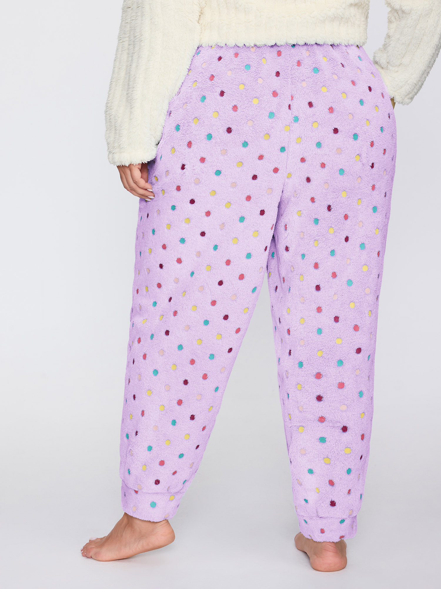 Side view of BloomChic Women's Plus Size Fluffy Textured Polka Dots Lounge Bottoms Lilac 30/6X