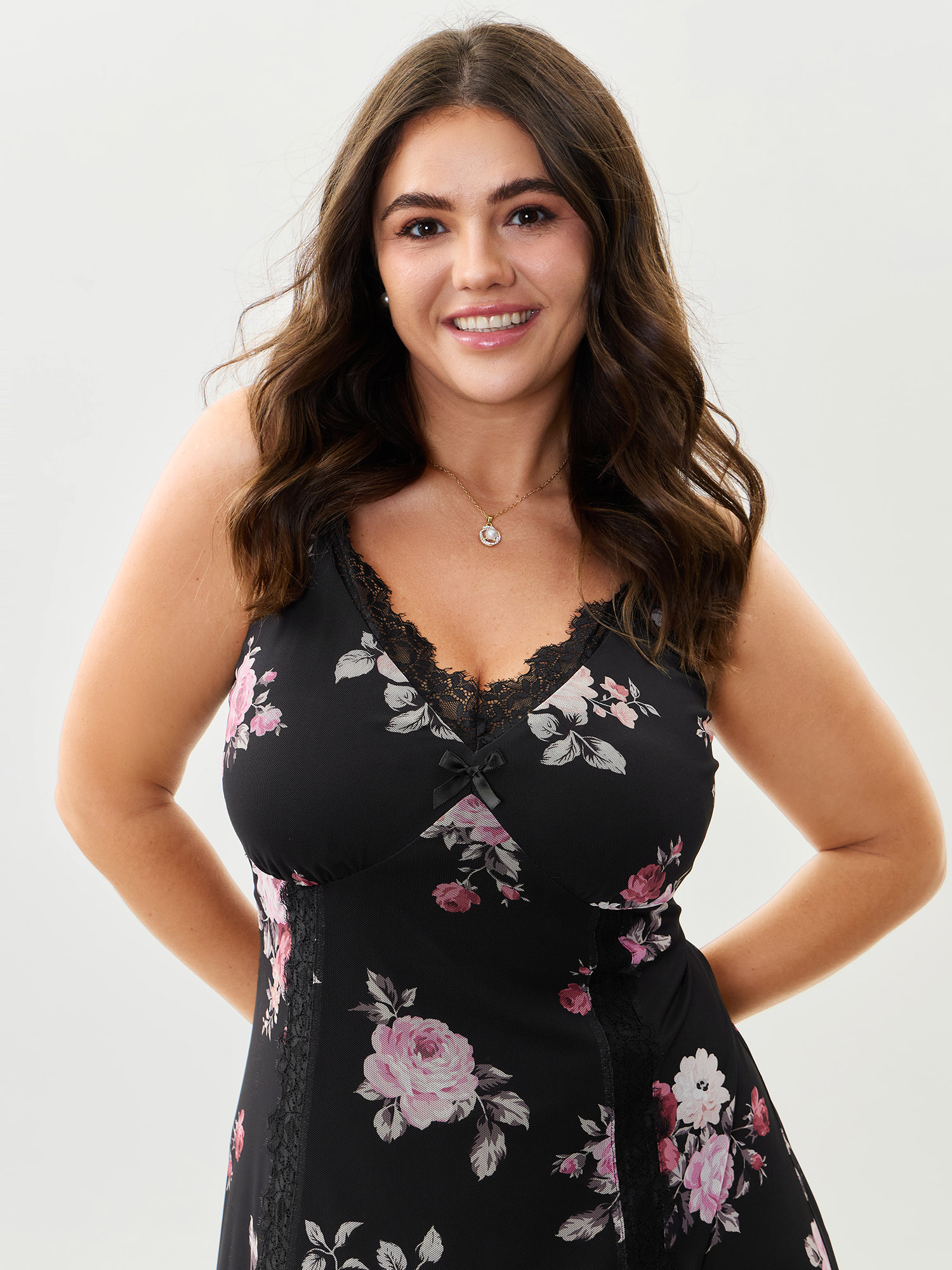 Side view of BloomChic Women's Plus Size Floral Romance Print Sheer Slit Nightgown Black Sleeveless Midi V-Neck 30/6X