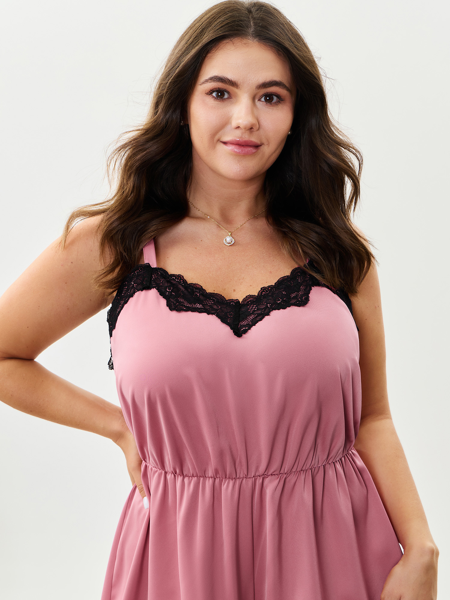 Side view of BloomChic Women's Plus Size Satin Lace Trim Color Contrast Pajama Romper Watermelon Solid V-Neck Pajama Jumpsuits 12/L