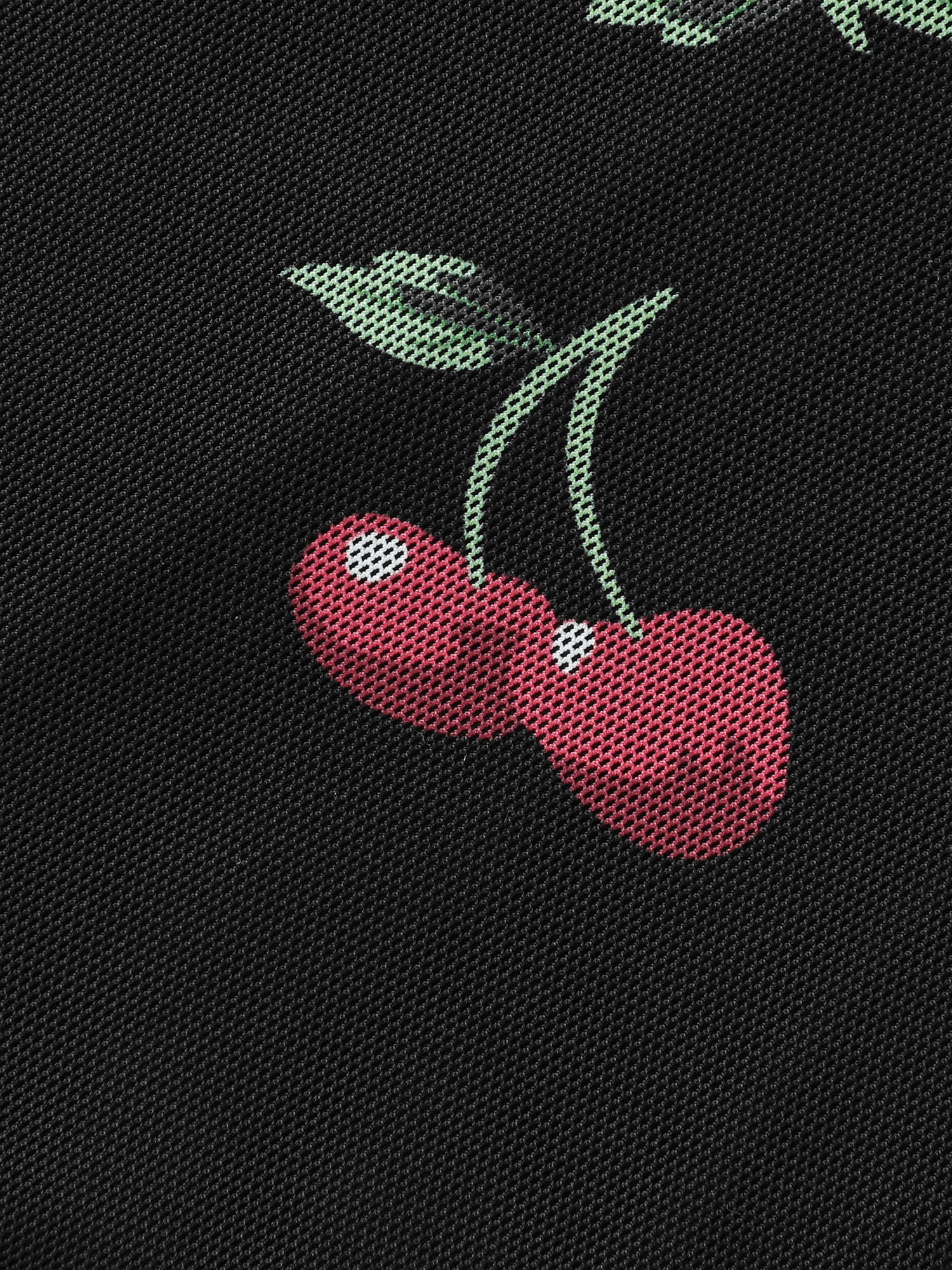 Side view of BloomChic Women's Plus Size Sweet Cherry Lace Sleeve Lounge Romper Black Fruit V-Neck Pajama Jumpsuits 14-16/1X