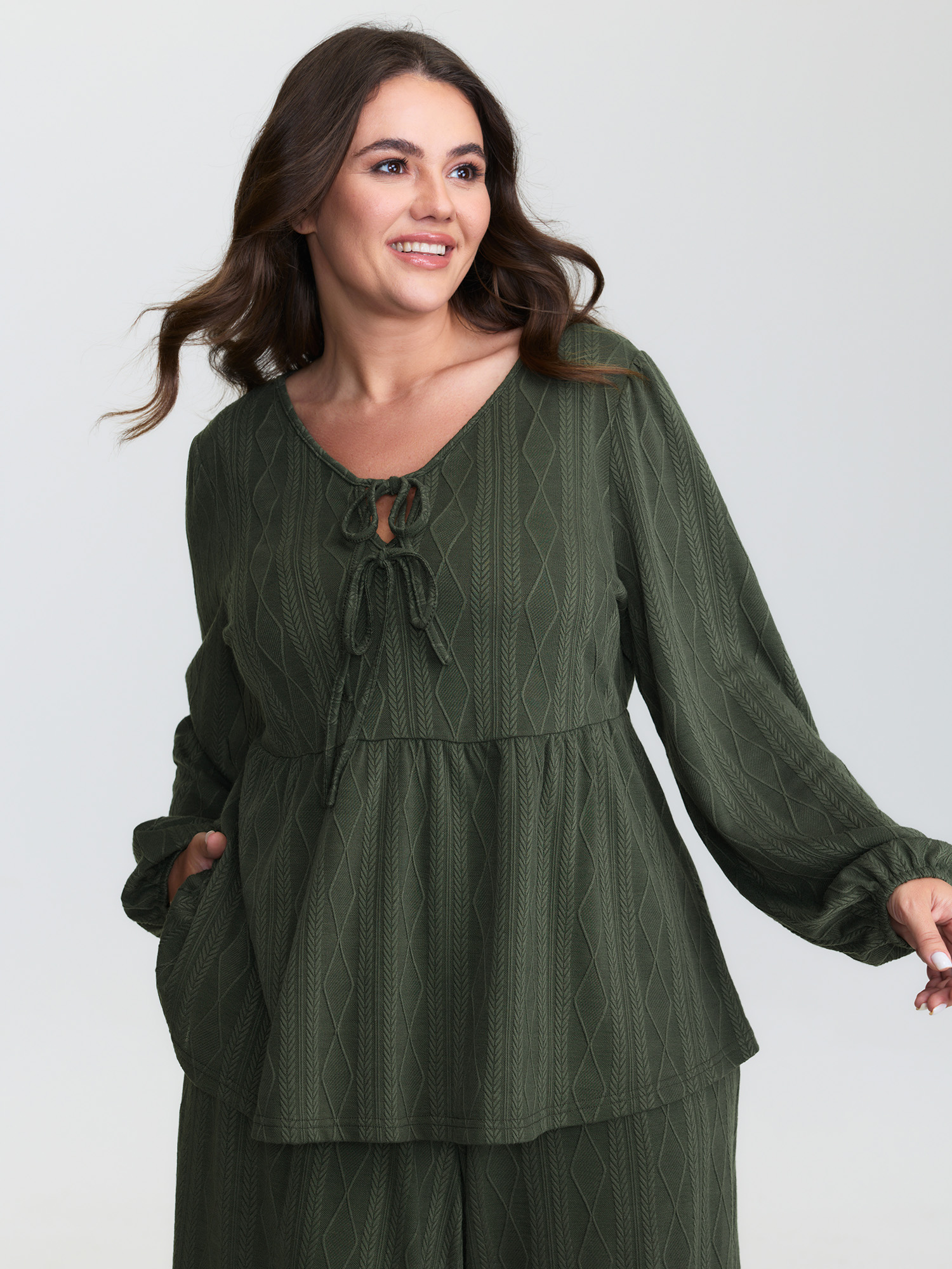 Side view of BloomChic Women's Plus Size Textured Front-Tie Relaxed-Fit Lounge Set ArmyGreen Solid Long Sleeve Lace-Up 30/6X