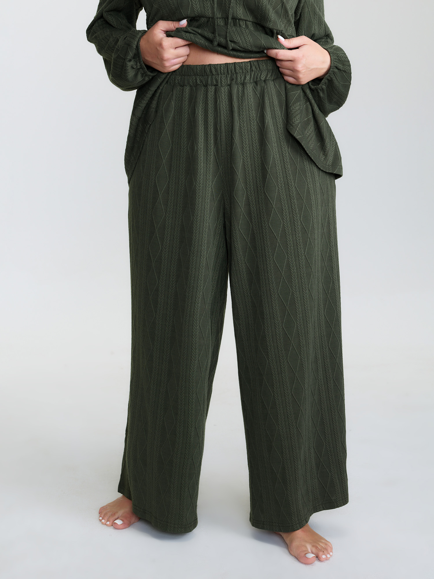 Side view of BloomChic Women's Plus Size Textured Front-Tie Relaxed-Fit Lounge Set ArmyGreen Solid Long Sleeve Lace-Up 30/6X
