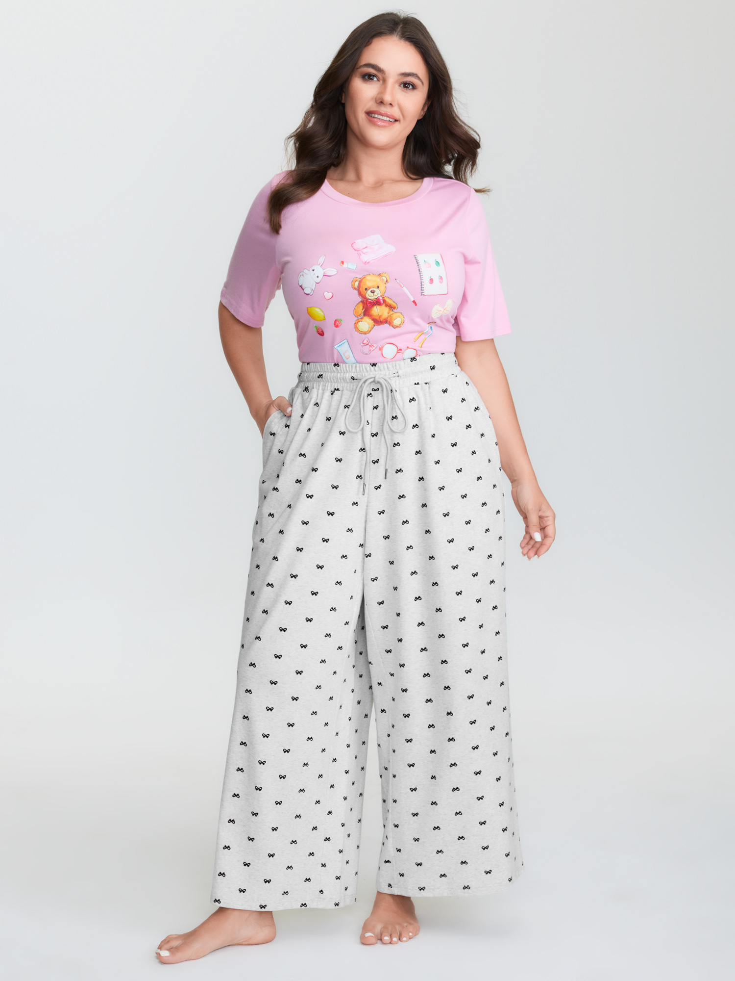 Side view of BloomChic Women's Plus Size Cotton Polka Dots Heather Drawstring Lounge Pants LightGray 28/5X