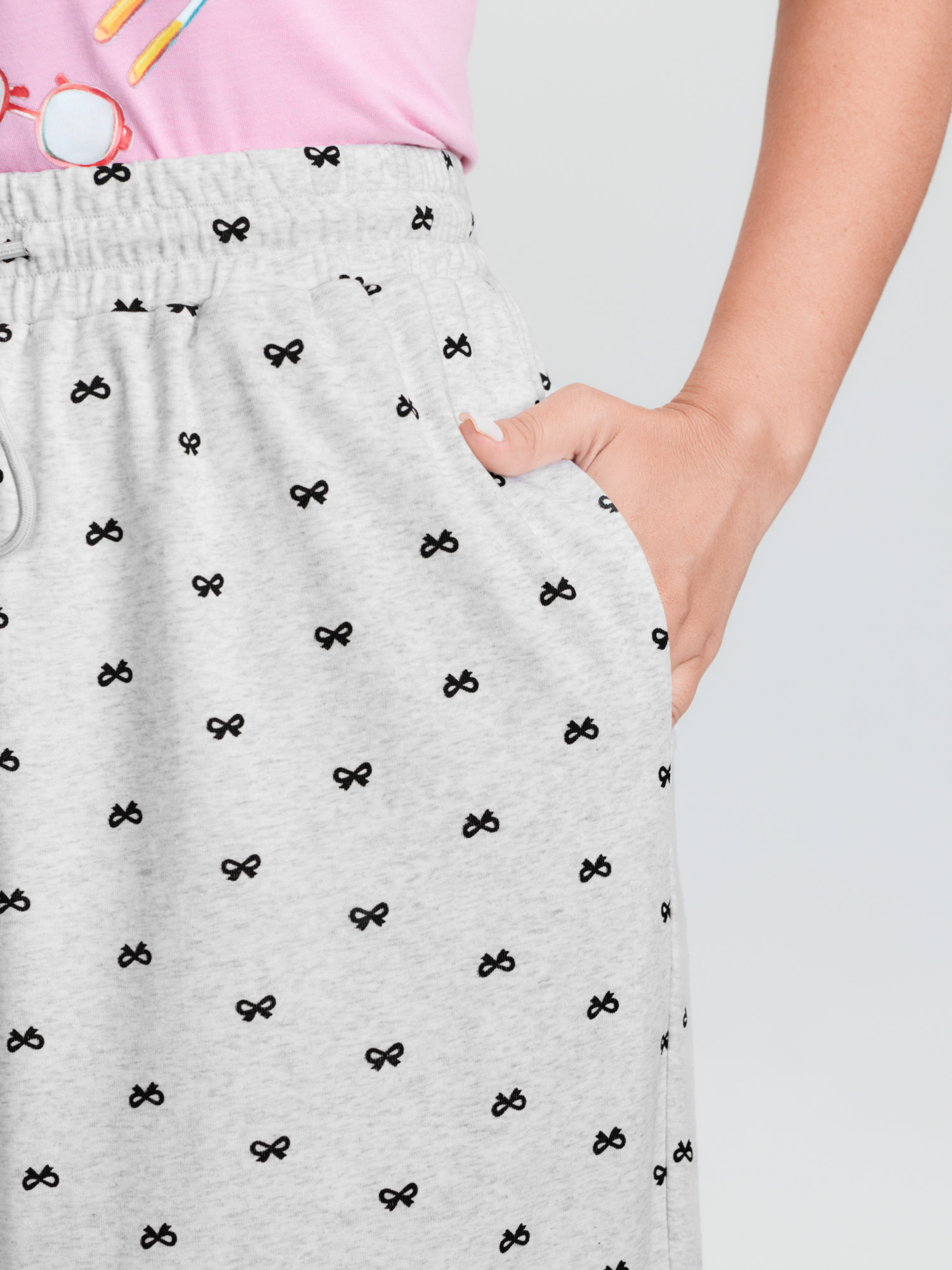 Side view of BloomChic Women's Plus Size Cotton Polka Dots Heather Drawstring Lounge Pants LightGray 28/5X