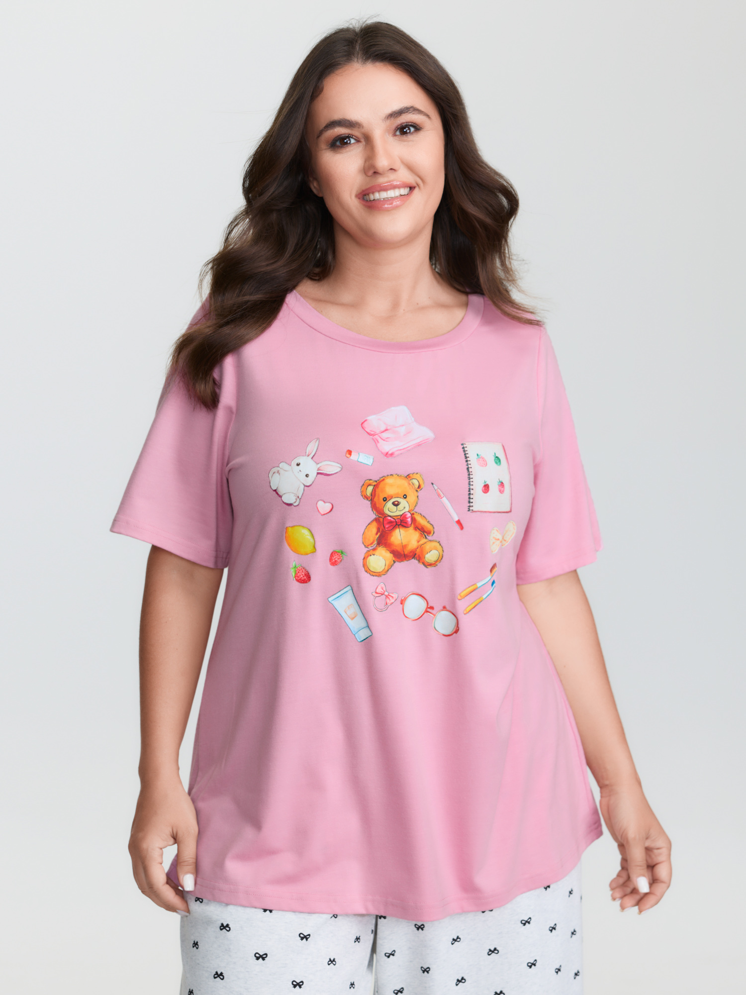 Side view of BloomChic Women's Plus Size Teddy Bear Graphic Print Pajama Top Beanpastepowder Naive Art Short sleeve Round Neck 10/M