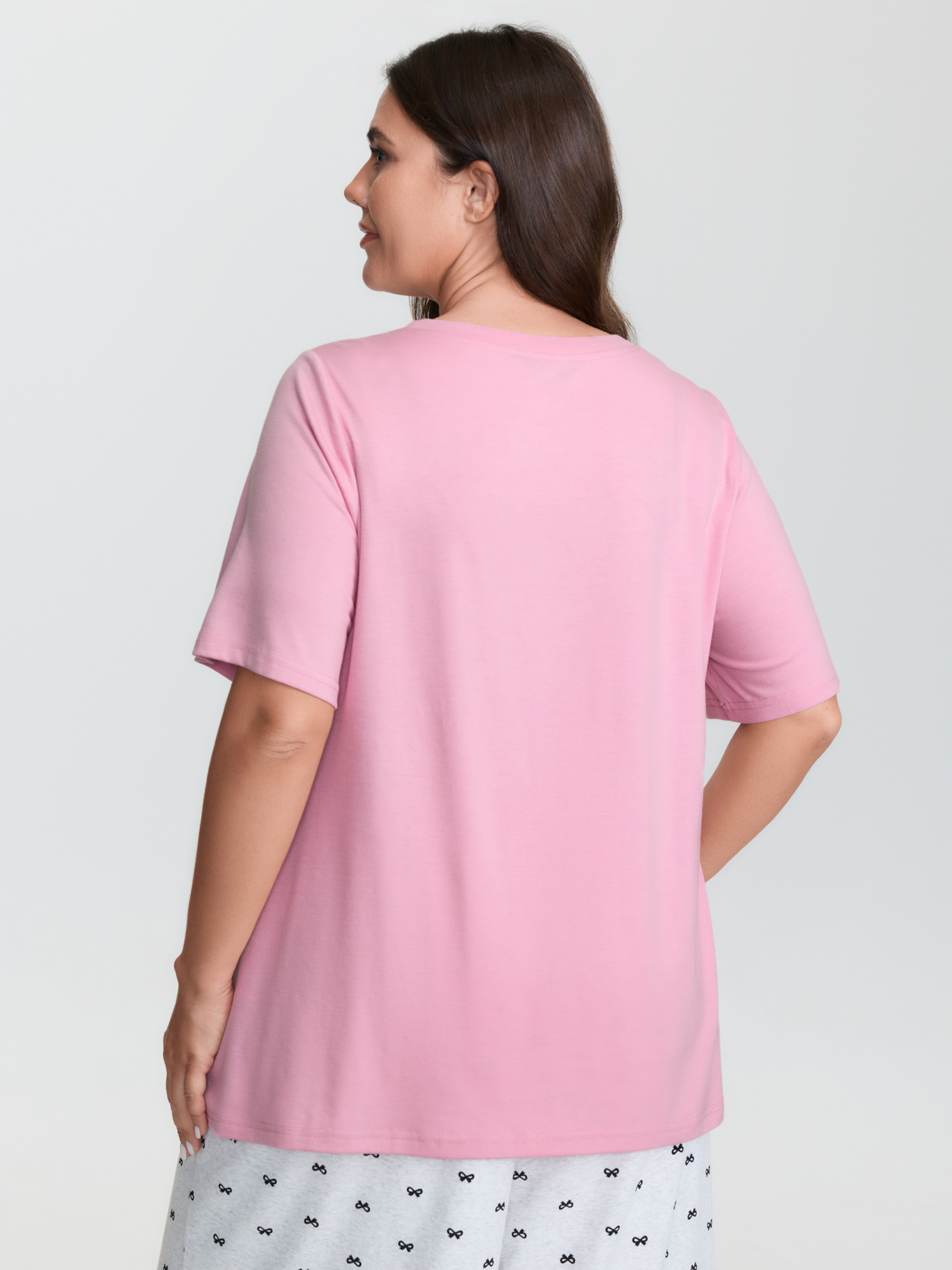 Side view of BloomChic Women's Plus Size Teddy Bear Graphic Print Pajama Top Beanpastepowder Naive Art Short sleeve Round Neck 10/M