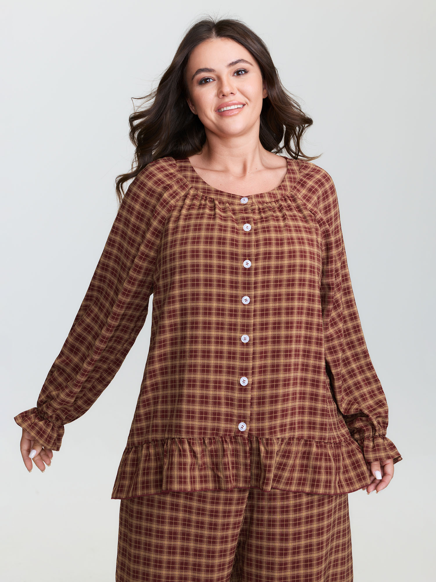 Side view of BloomChic Women's Plus Size Gingham Print Ruffled Hem Co-Ord Pajama Set Coral not graphics 22-24/3X