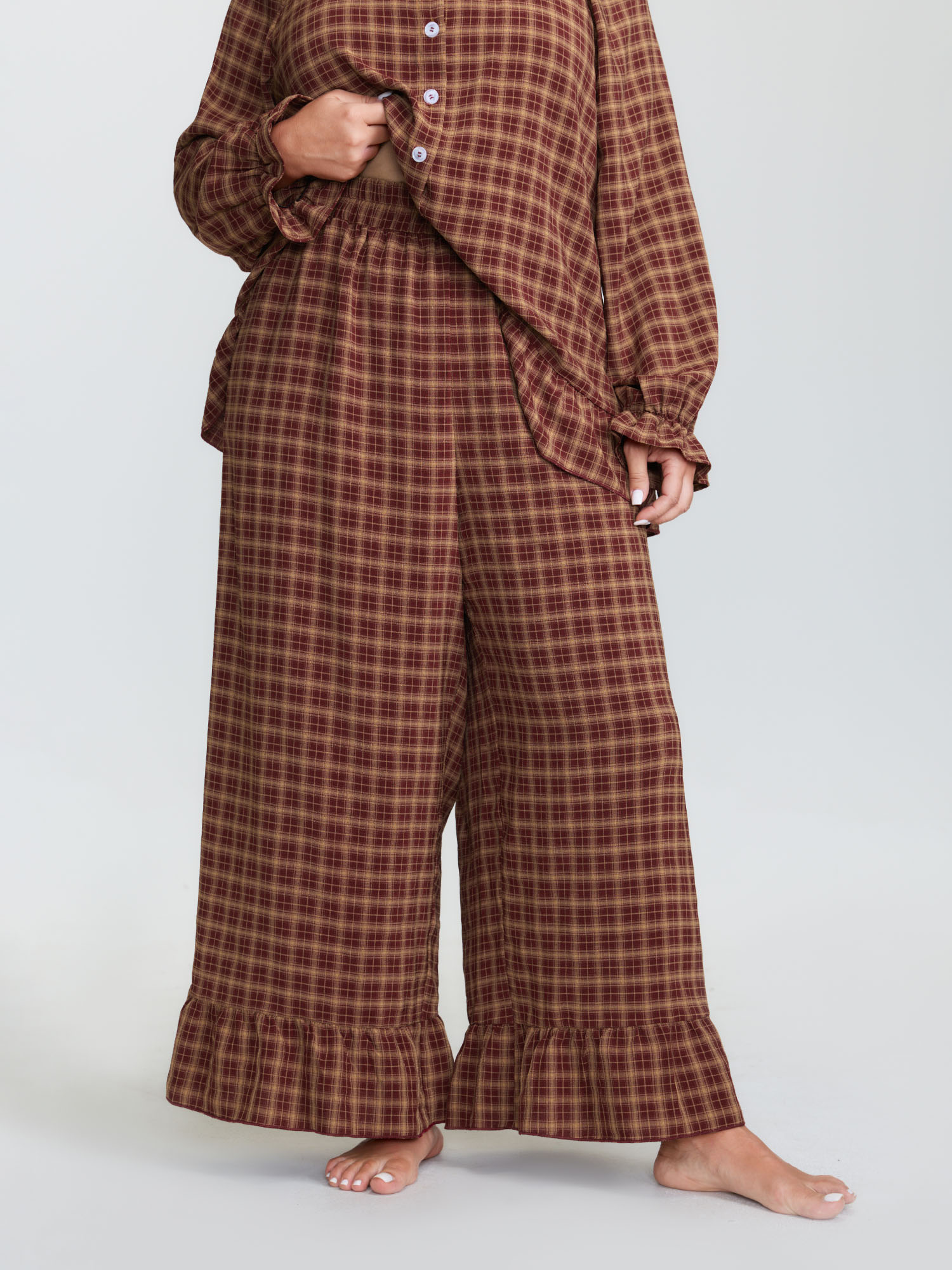 Side view of BloomChic Women's Plus Size Gingham Print Ruffled Hem Co-Ord Pajama Set Coral not graphics 22-24/3X