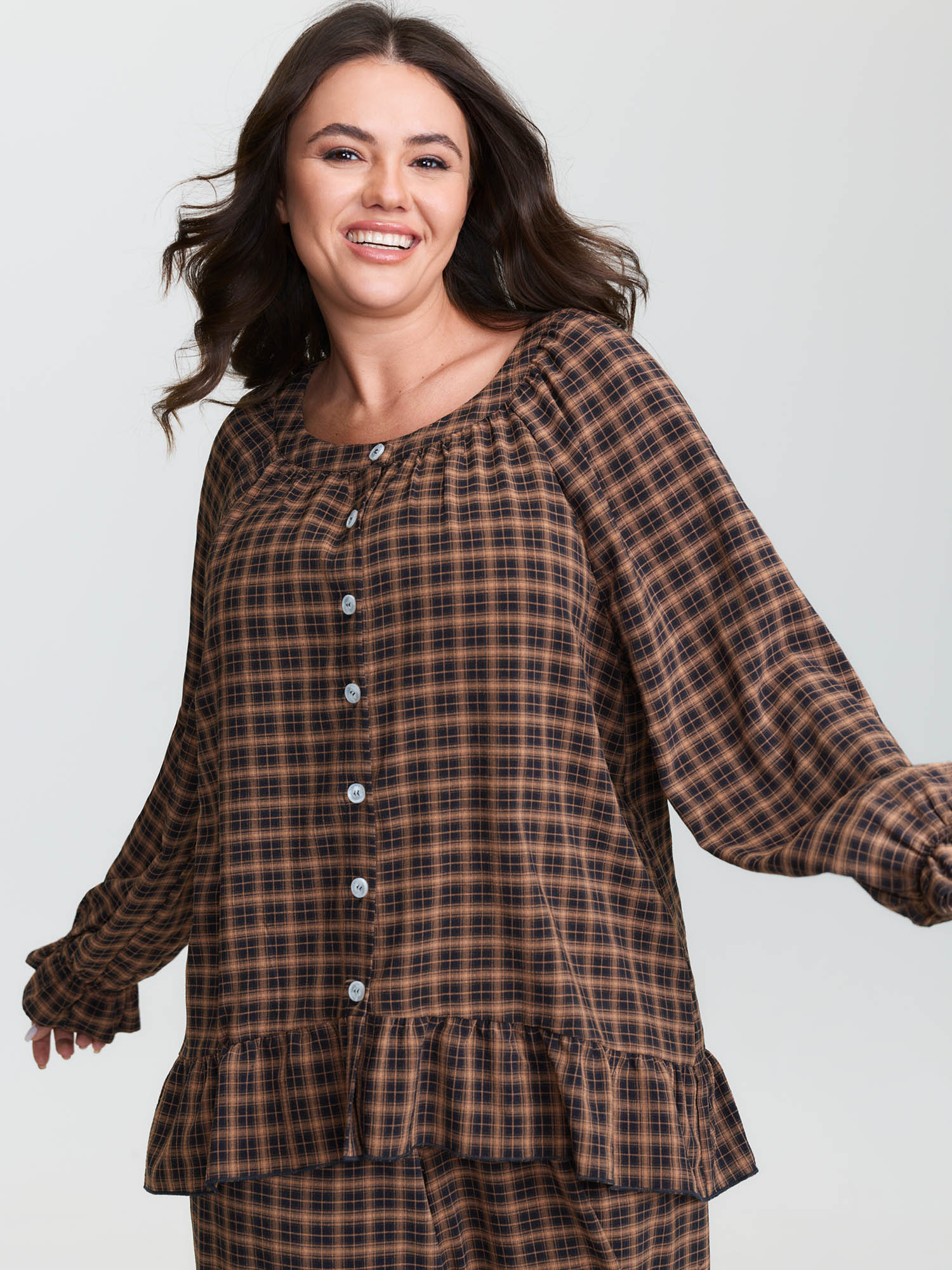 Side view of BloomChic Women's Plus Size Gingham Print Ruffled Hem Co-Ord Pajama Set Rust not graphics 28/5X