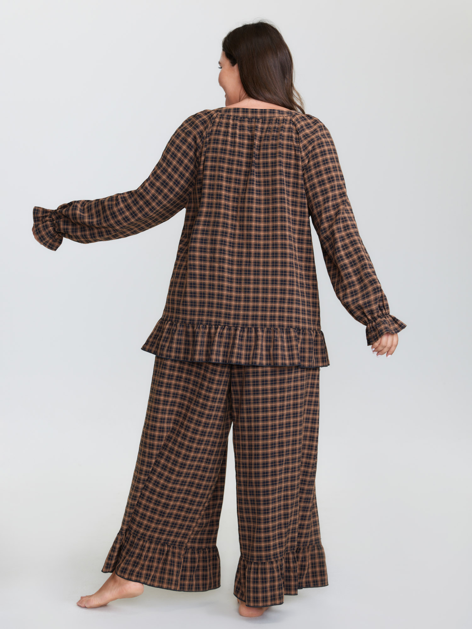 Side view of BloomChic Women's Plus Size Gingham Print Ruffled Hem Co-Ord Pajama Set Rust not graphics 28/5X