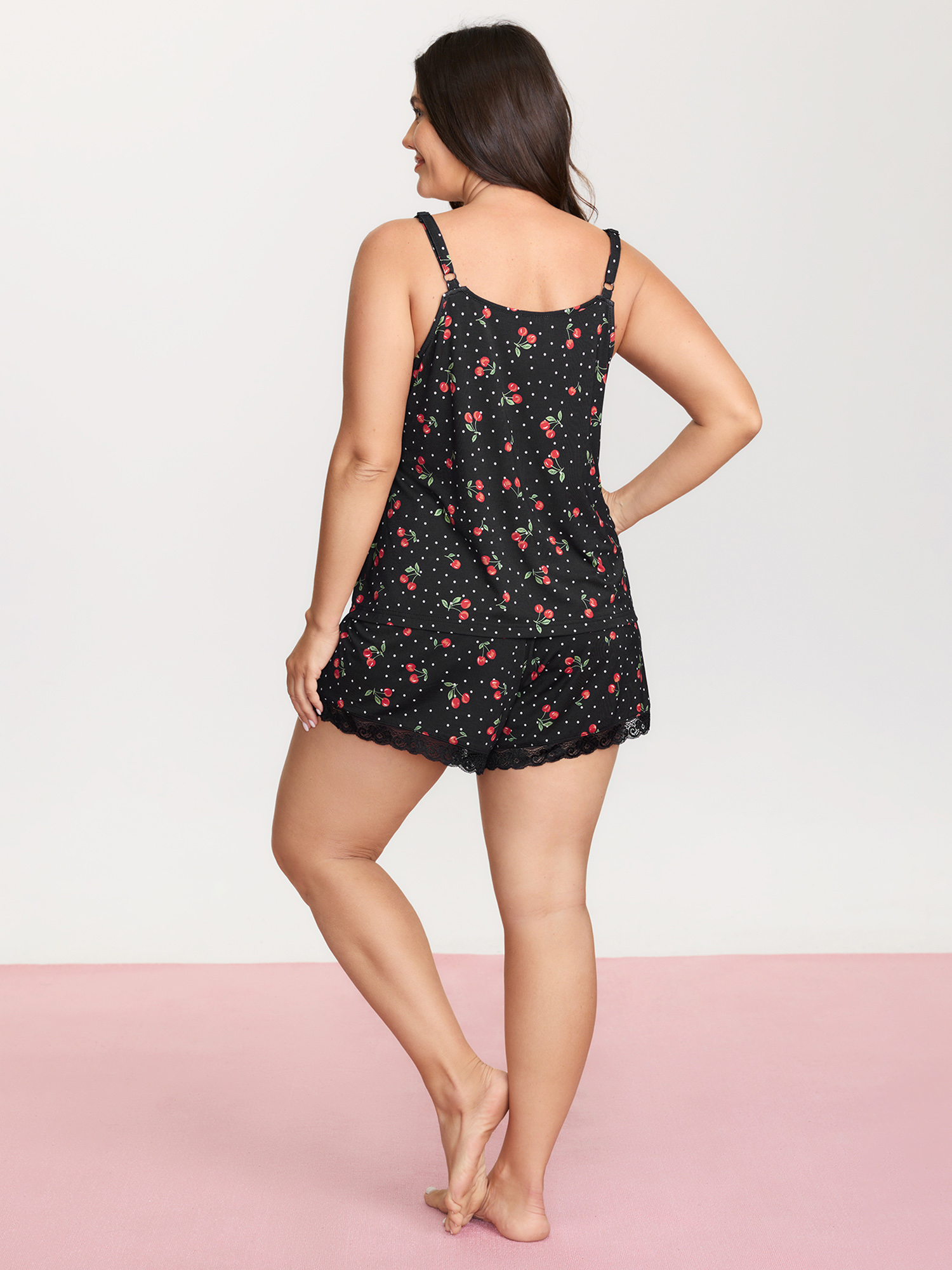 Side view of BloomChic Women's Plus Size Supersoft Cherry Print Lace Pockets Pajama Set Black not graphics 12/L