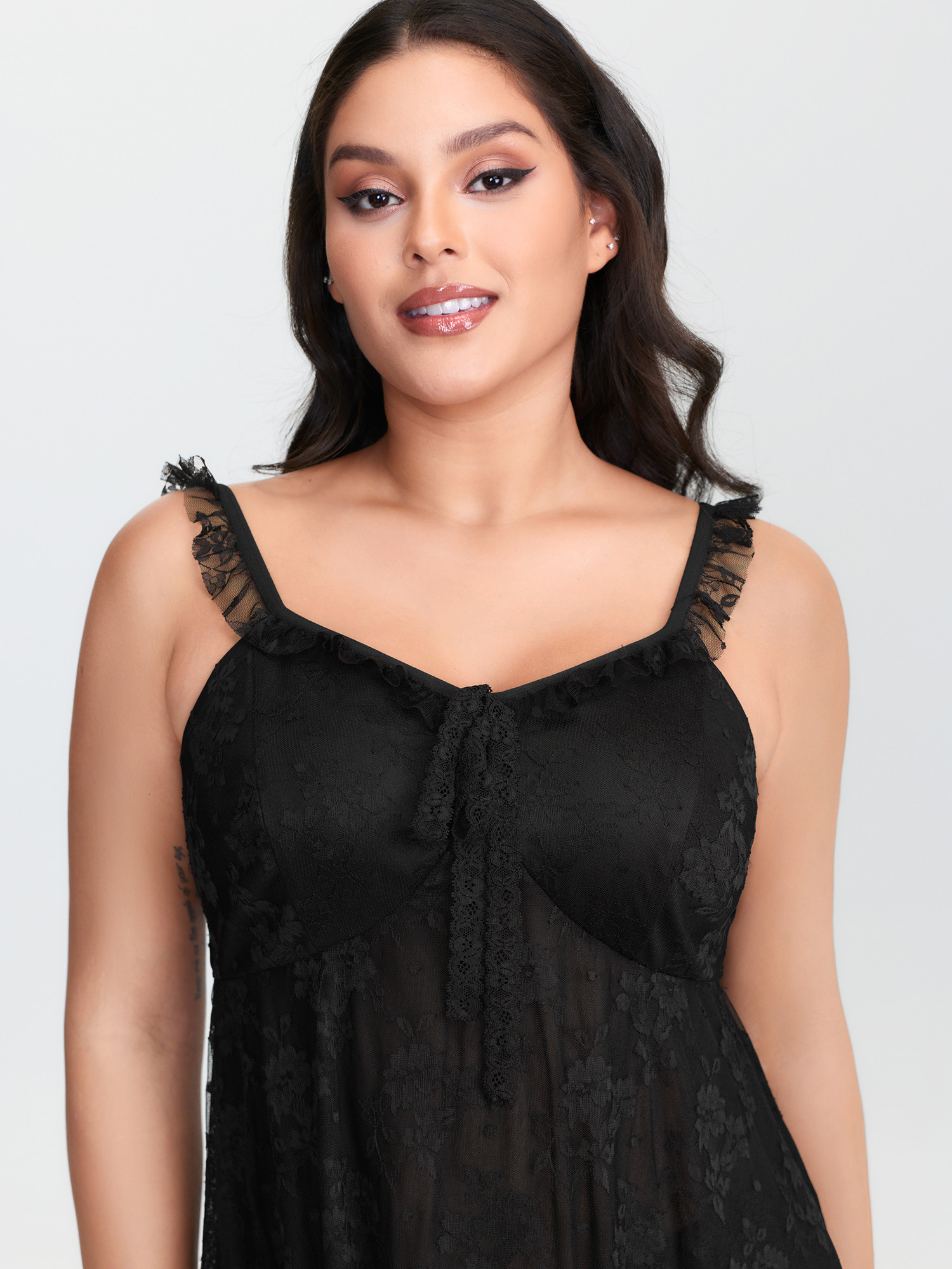Side view of BloomChic Women's Plus Size Floral Lace Ruffled Straps Lined Nightgown Black Sleeveless Mini V-Neck 12/L