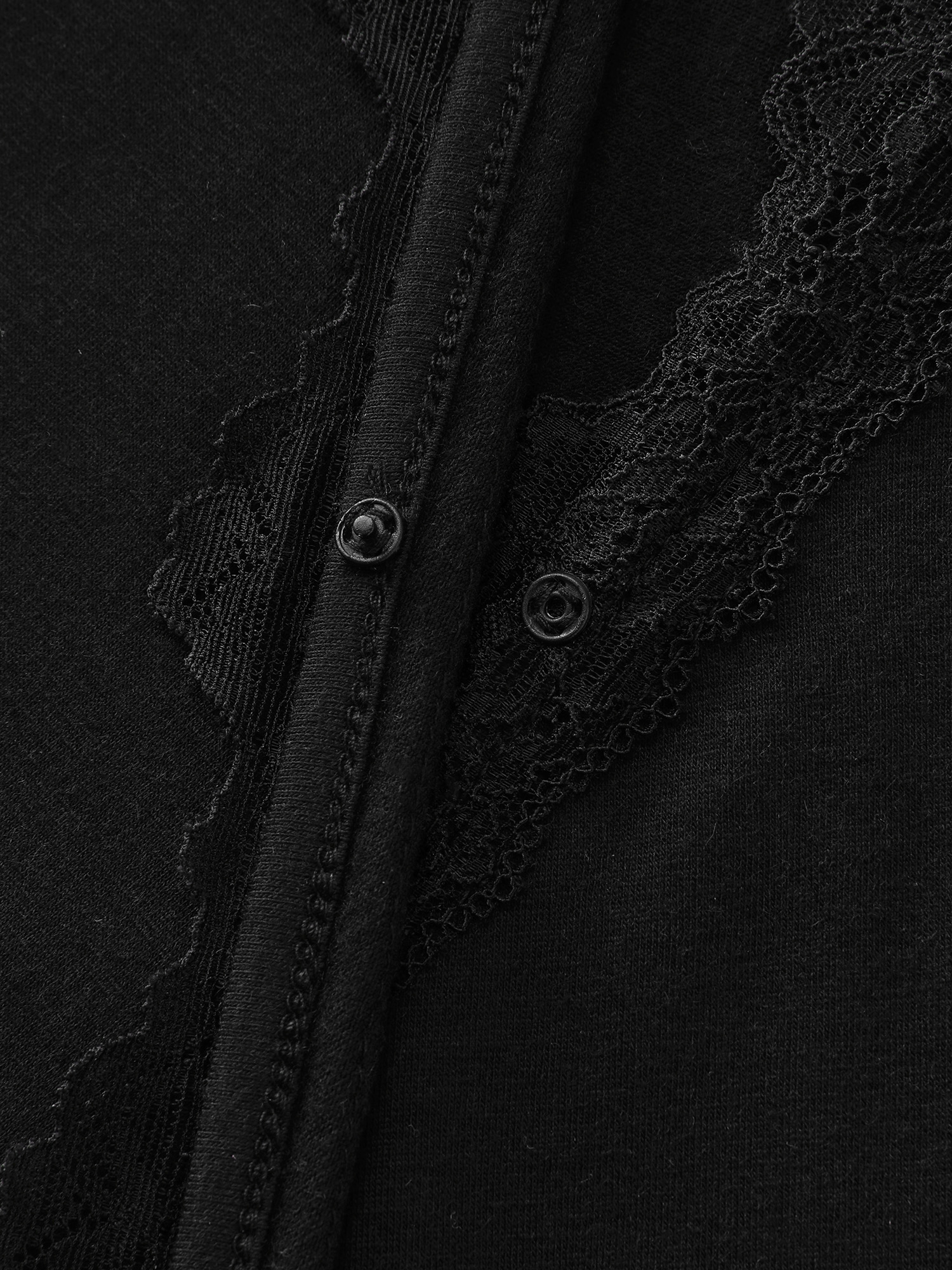 Side view of BloomChic Women's Plus Size Lace Trim Side-Tie Pockets Nightgown Black Short sleeve Mini V-Neck 30/6X