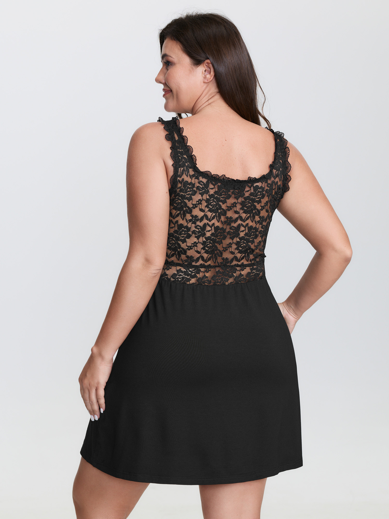 Side view of BloomChic Women's Plus Size Lace Trim Semi-Sheer Waist Nightgown Black Sleeveless Mini V-Neck 30/6X
