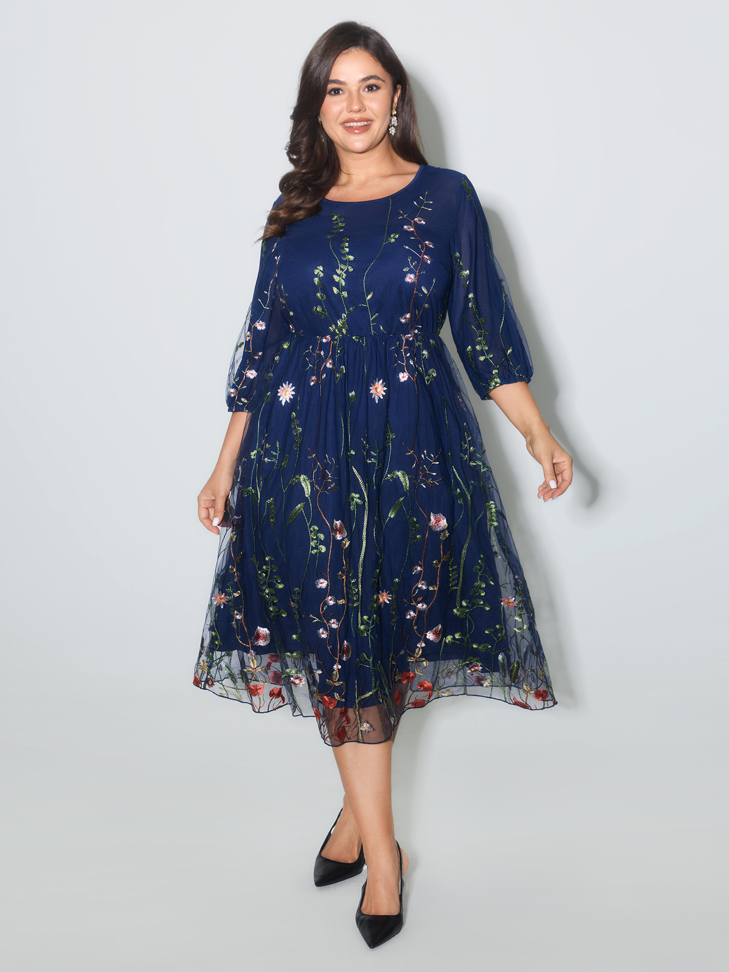 Side view of BloomChic Women's Plus Size Floral Embroidered Elastic Waist Lined Midi Dress Navy Party Midi Mesh Panel Round Neck 18-20/2X