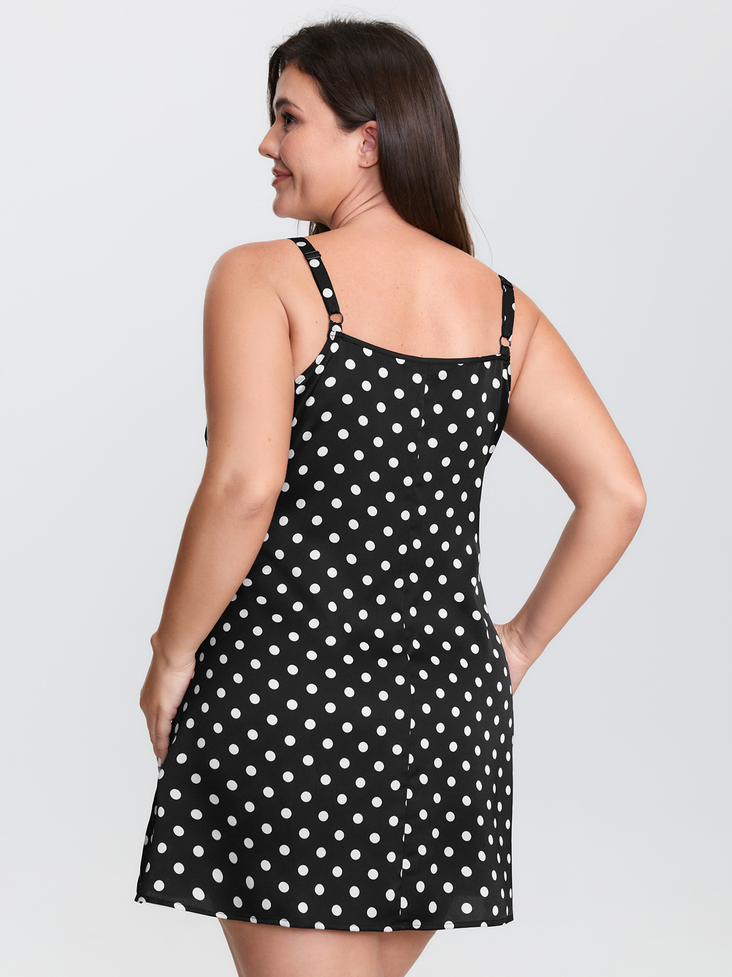 Side view of BloomChic Women's Plus Size Polka Dot Charm V-Neckline Nightgown Black Sleeveless Mini Deep V-Neck 14-16/1X