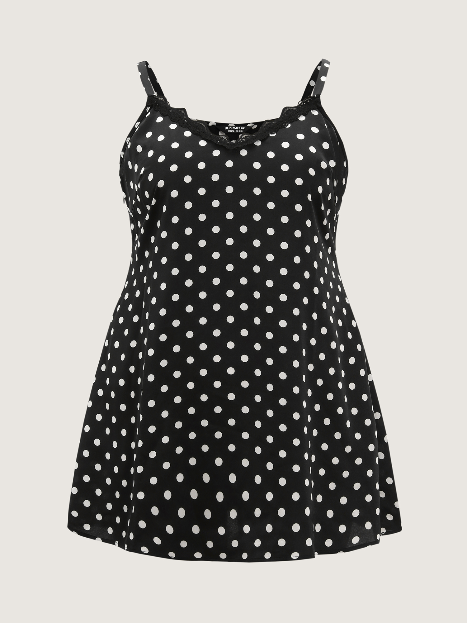Side view of BloomChic Women's Plus Size Polka Dot Charm V-Neckline Nightgown Black Sleeveless Mini Deep V-Neck 14-16/1X