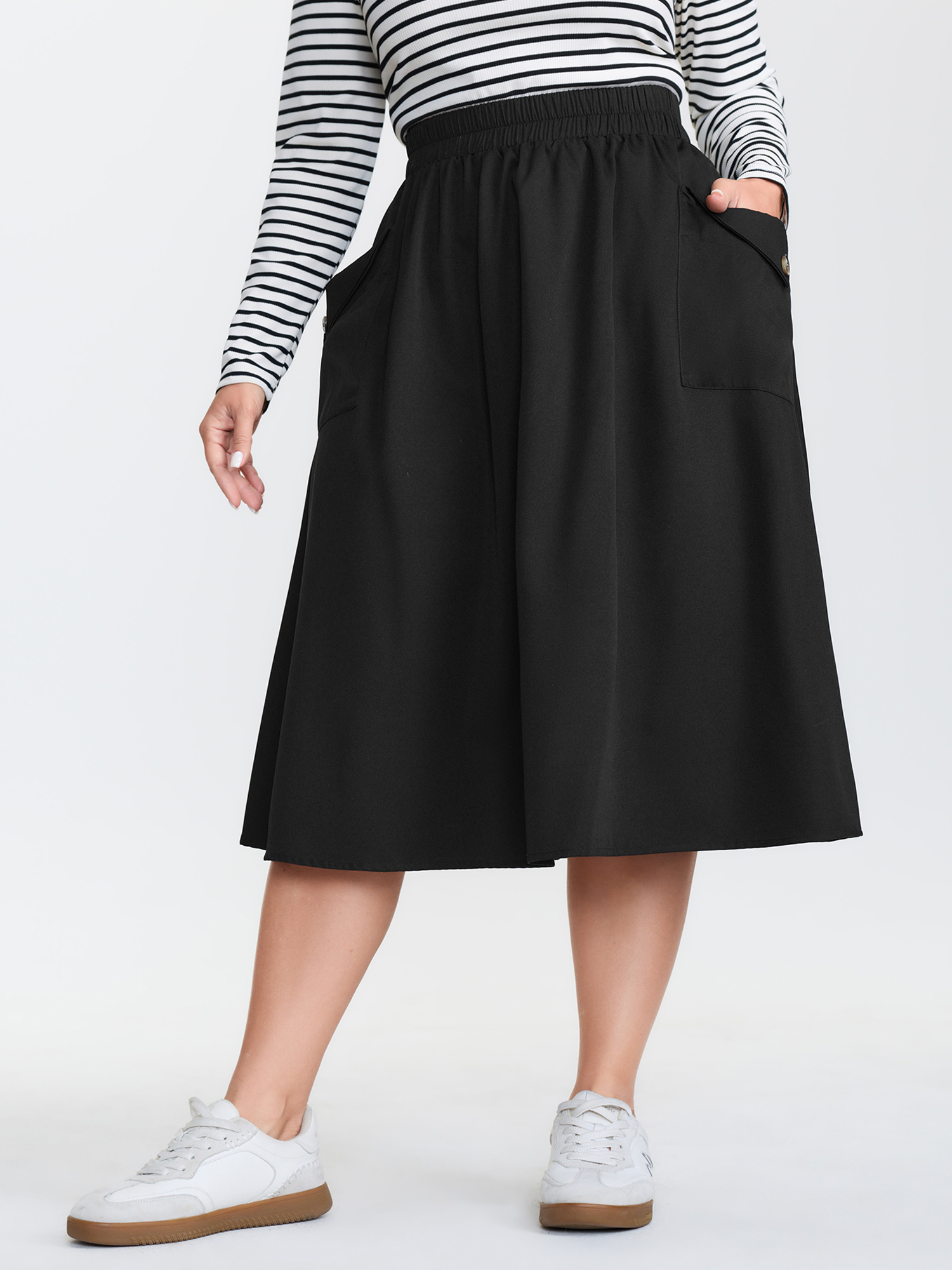 BloomChic Women's Plus Size Plain Pockets A-Line Midi Skirt Black Smocked Straight fit Everyday-Casual 10/M