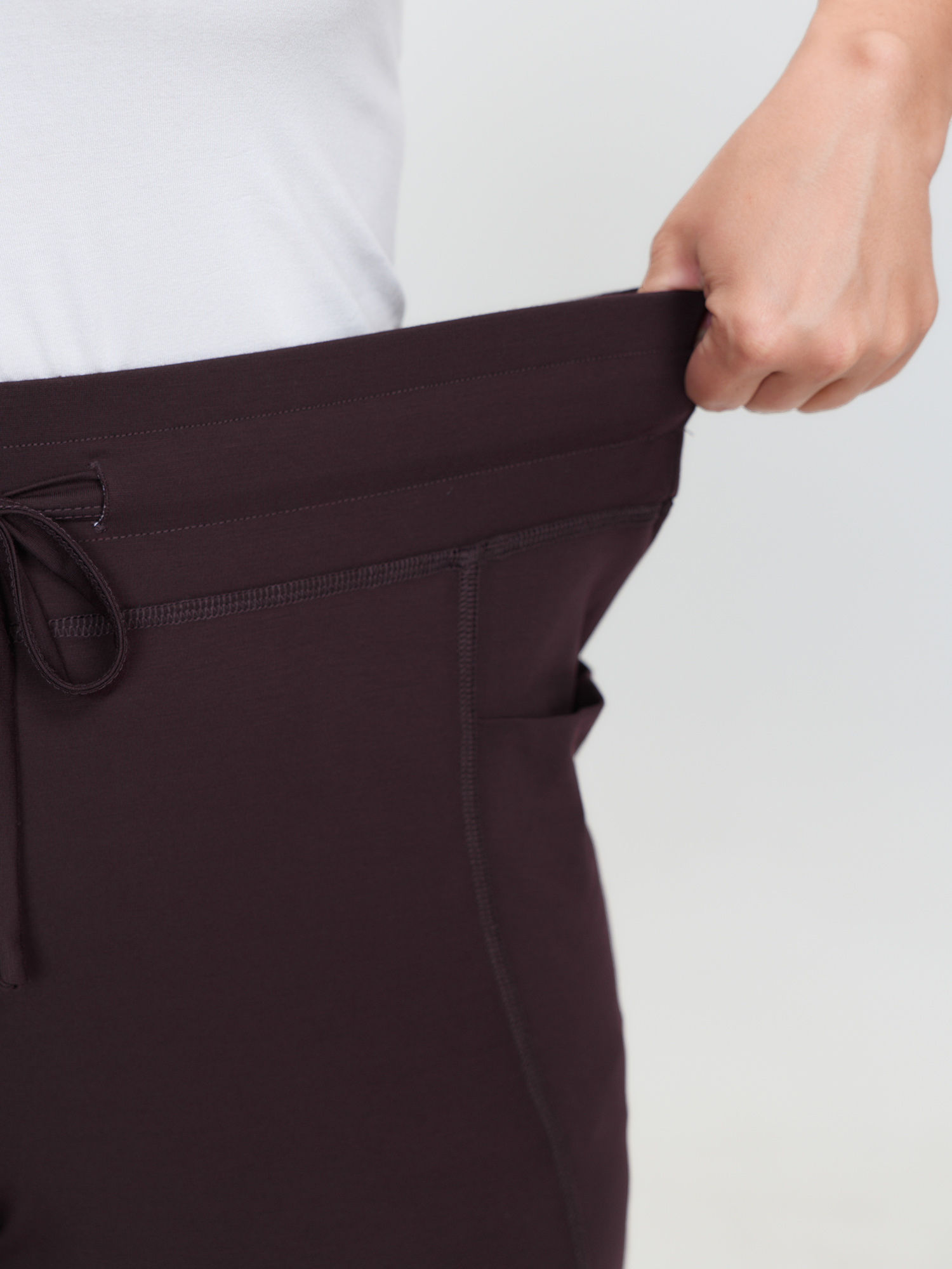 Side view of BloomChic Women's Plus Size Supersoft Drawstring Bootcut Lounge Bottoms Browncoffeecolor Knee 12/L