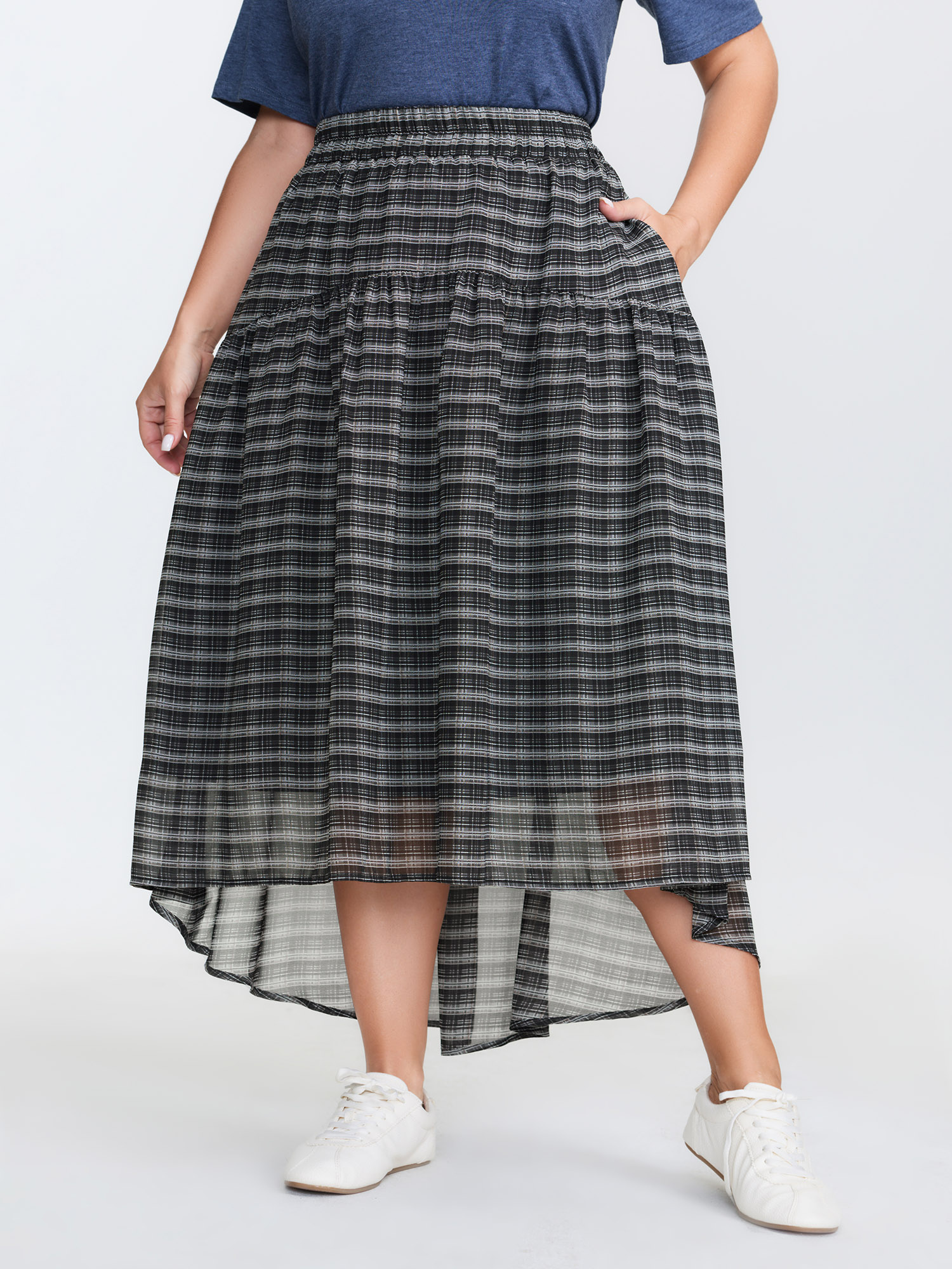 Side view of BloomChic Women's Plus Size Checkered High-Low Hem Maxi Skirt Black Gathered Flared Casual 30/6X