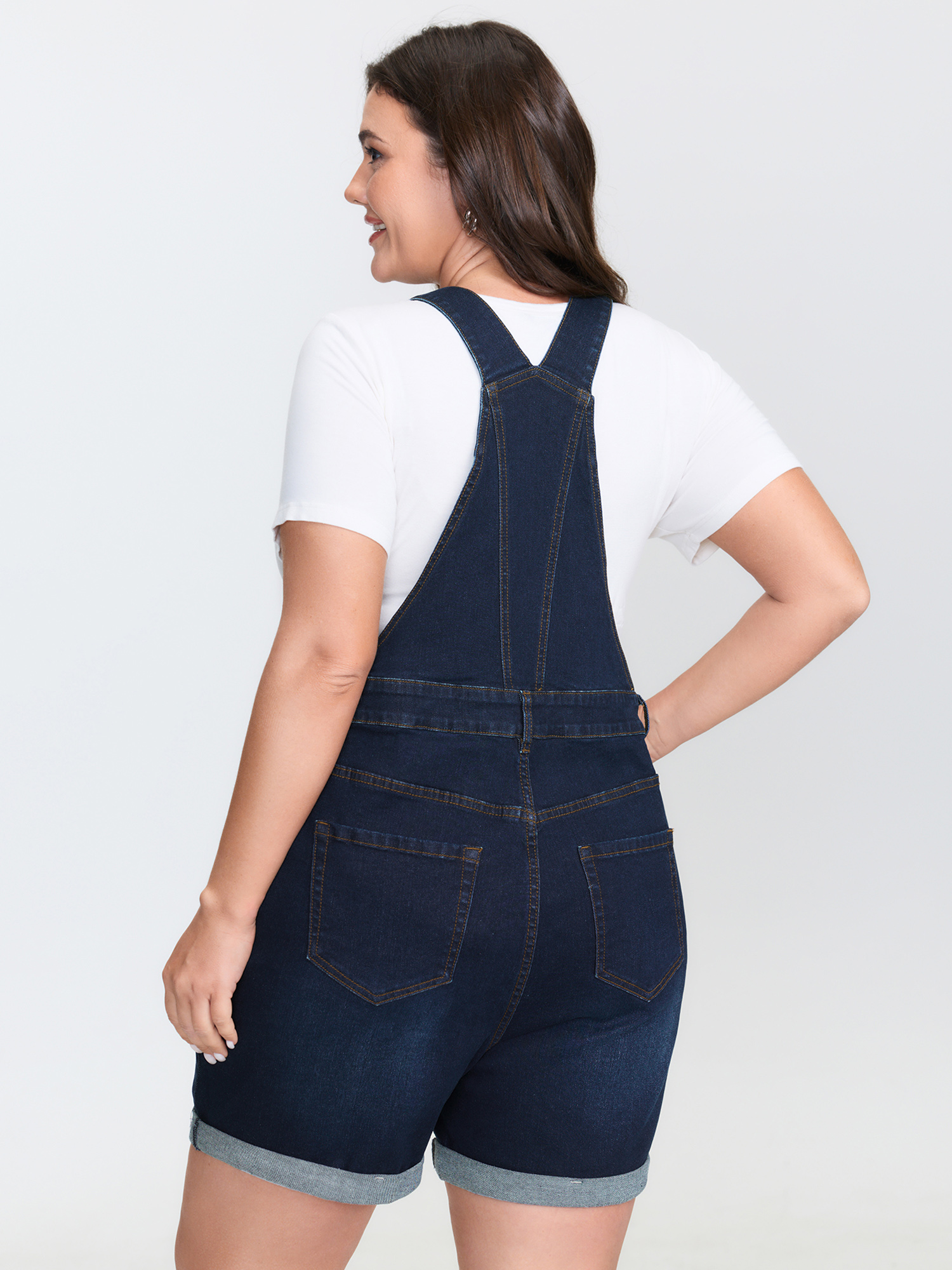 Side view of BloomChic Women's Plus Size Stretchy Straight-Leg Denim Overall Jumpsuit Denimindigo Casual High stretch 12/L