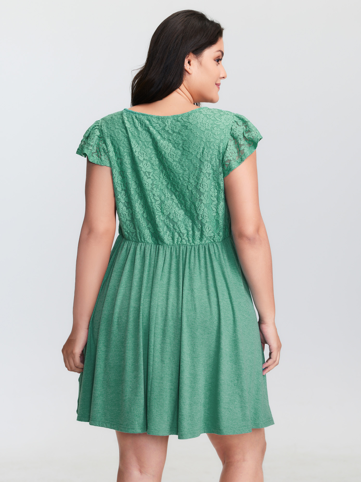Side view of BloomChic Women's Plus Size Textured Lace Ruffled Sleeve Nightgown Emerald Short sleeve 10/M