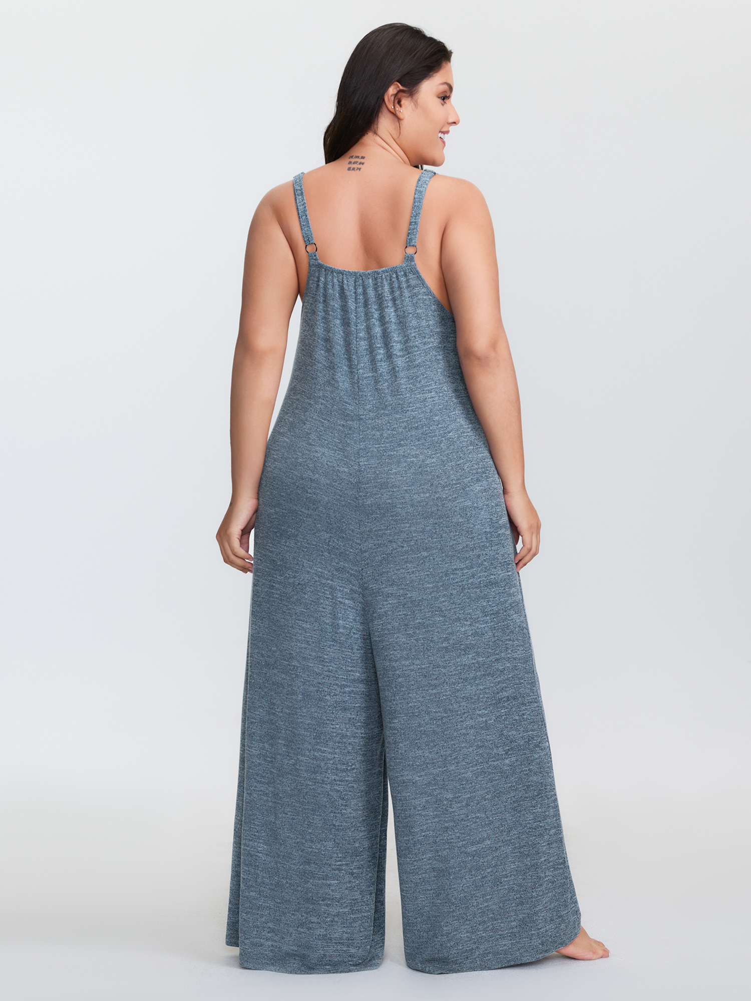 Side view of BloomChic Women's Plus Size Supersoft Flowy Cami Lounge Jumpsuit Aegean Maxi 10/M