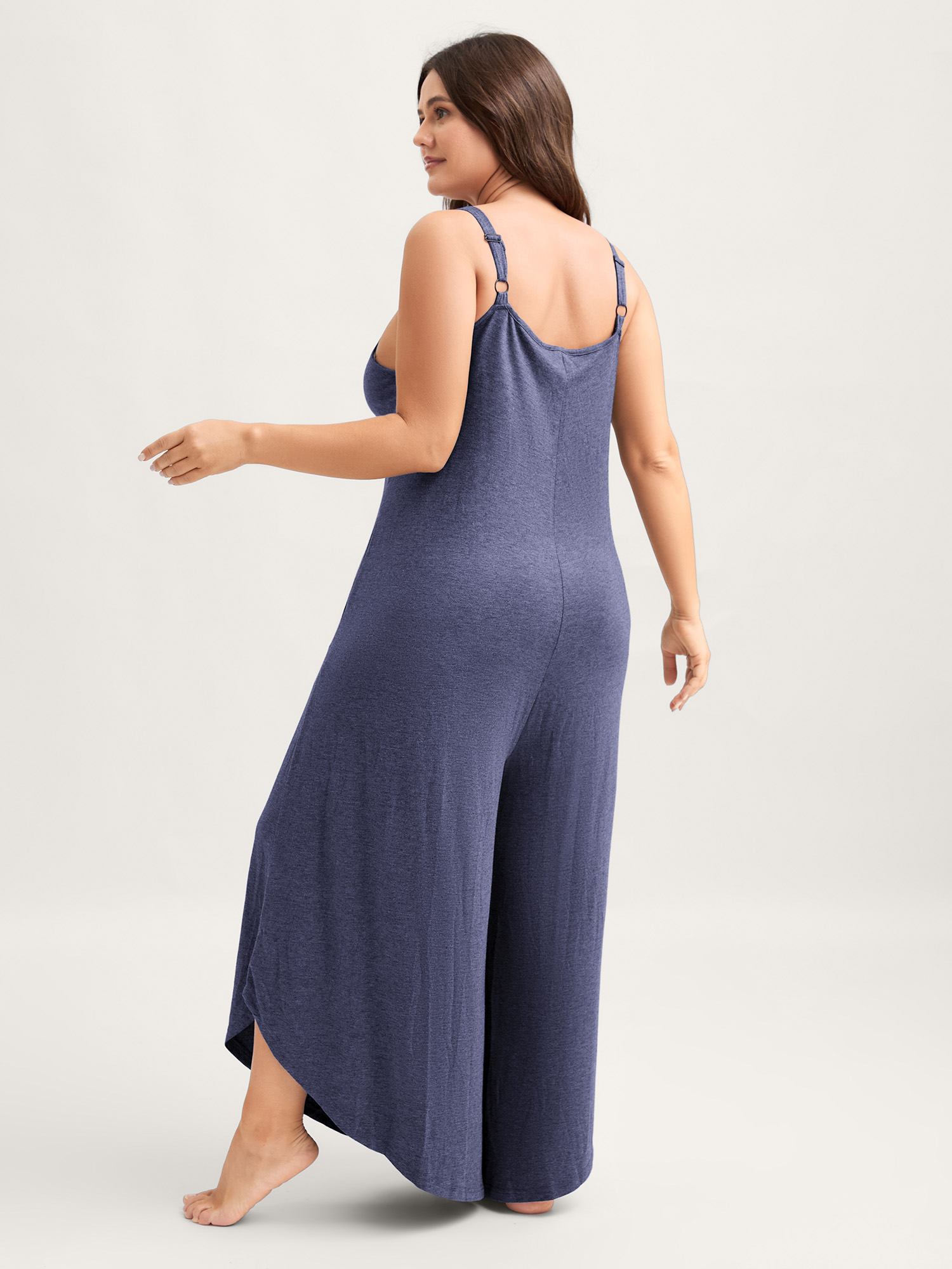 Side view of BloomChic Women's Plus Size Supersoft Wide-Leg Cami Lounge Jumpsuit Indigo not graphics Longline 28/5X