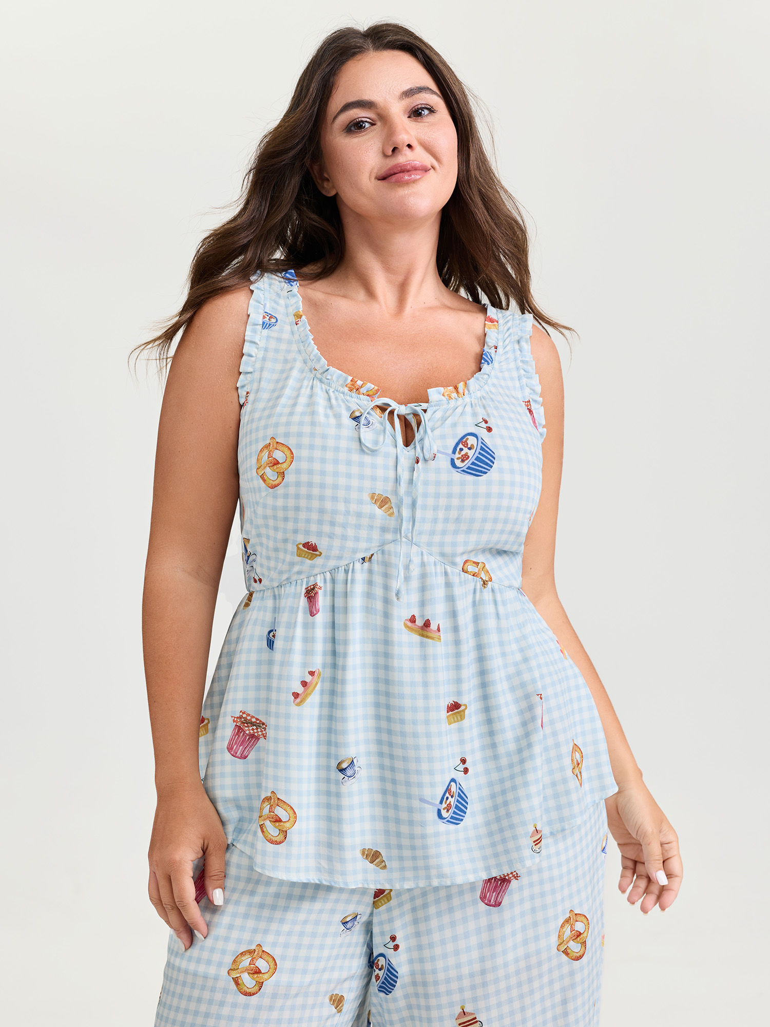 Side view of BloomChic Women's Plus Size Pretzel Coffee Print Drawstring Co-Ord Pajama Set LightBlue Plaid Sleeveless Tie knot 10/M