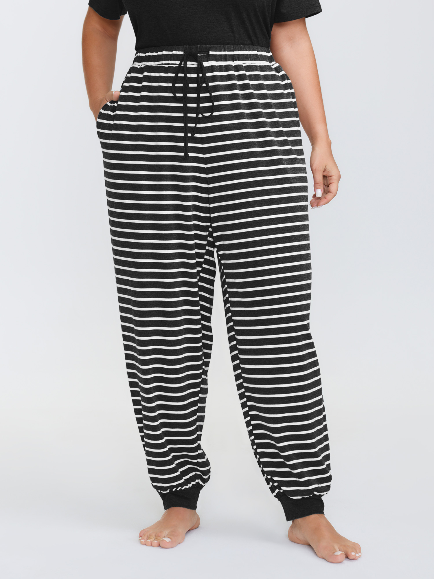 Side view of BloomChic Women's Plus Size Supersoft Striped Print Pajama Set Black 18-20/2X