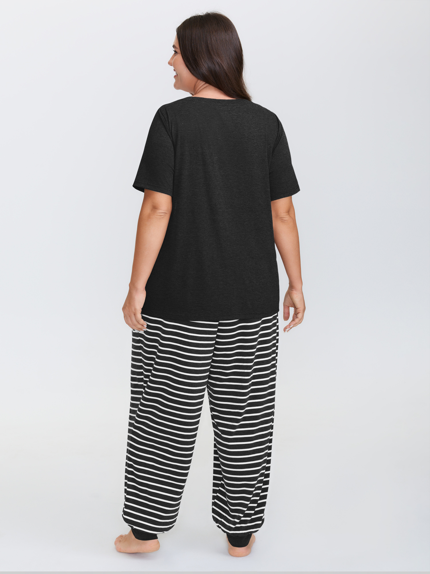 Side view of BloomChic Women's Plus Size Supersoft Striped Print Pajama Set Black 18-20/2X