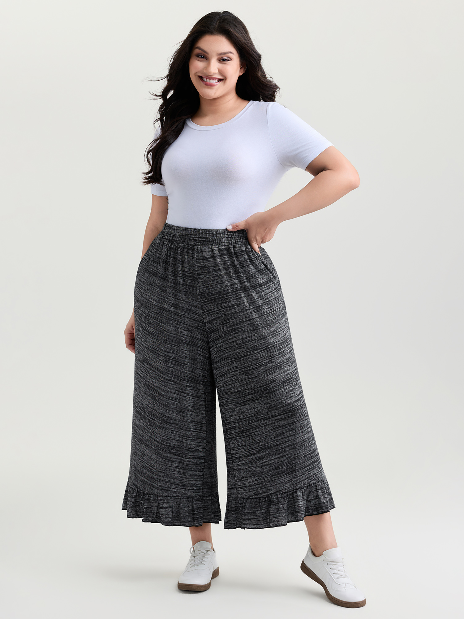 Side view of BloomChic Women's Plus Size Supersoft Ruffled Hem Wide-Leg Lounge Bottoms DimGray Ankle 28/5X
