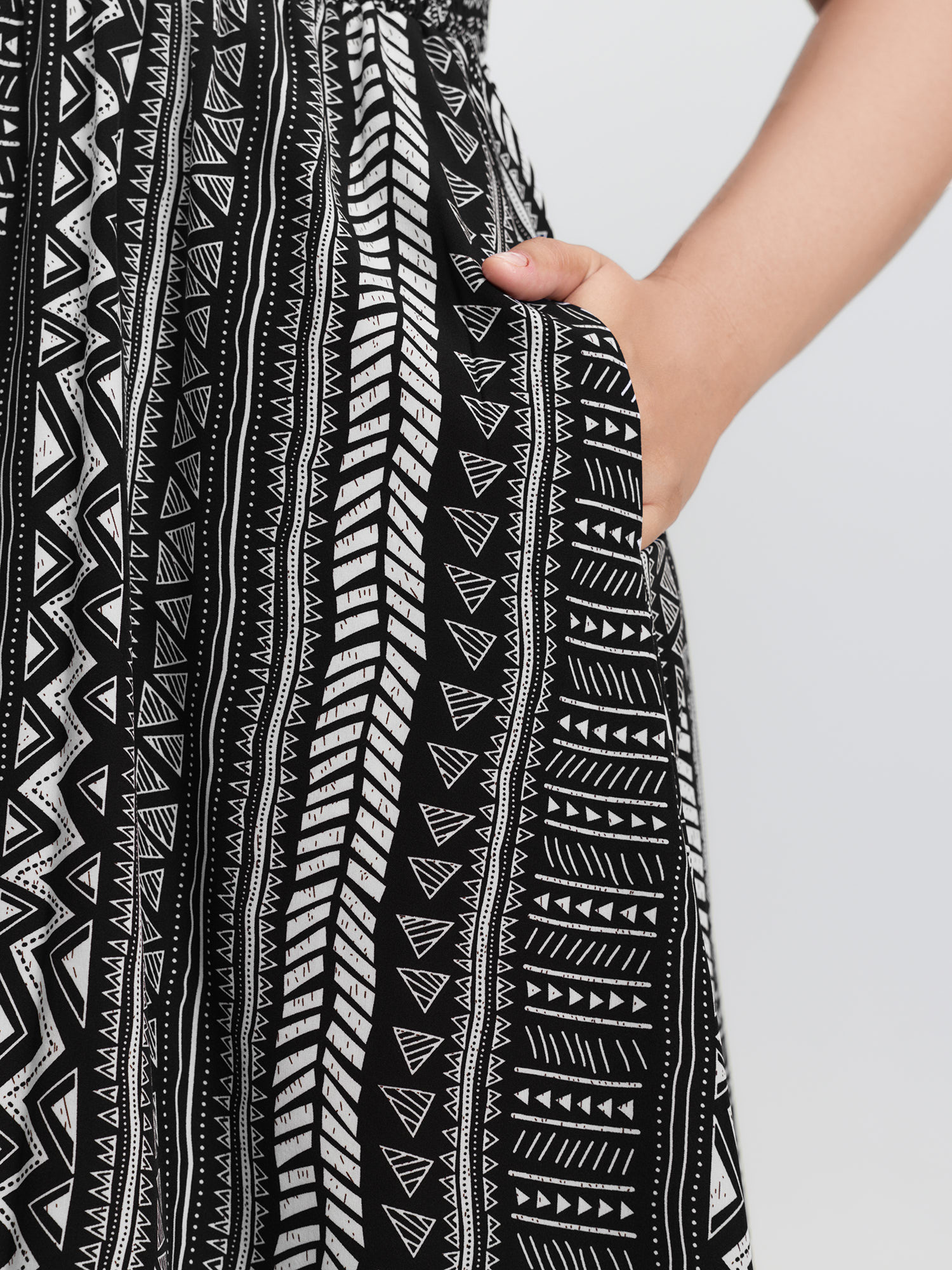 Side view of BloomChic Women's Plus Size Monochrome Striped Shirred Wide-Straps Midi Dress BlackFlower Midi Vacation 14-16/1X