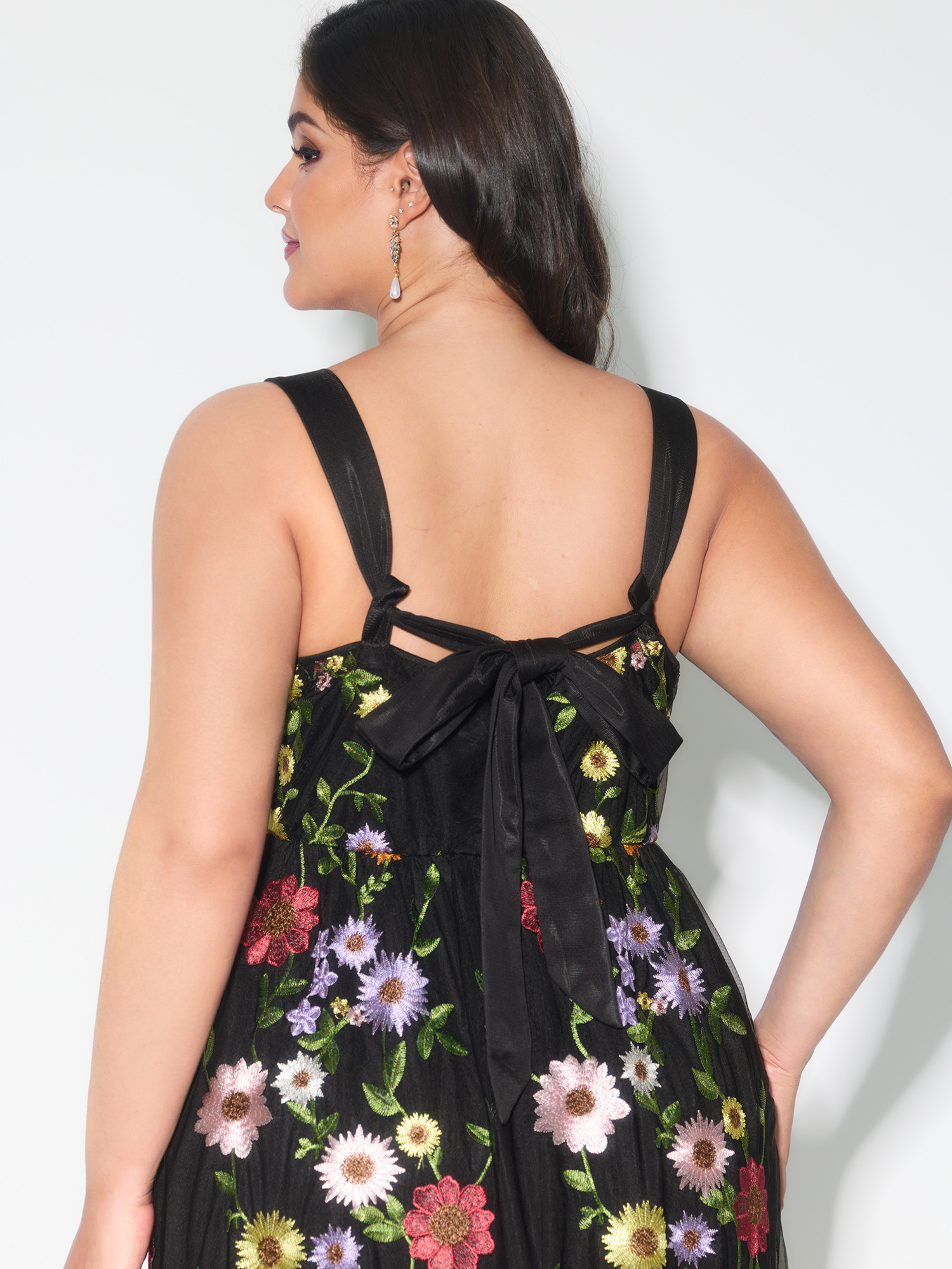 Side view of BloomChic Women's Plus Size Pretty Florals Embroidered Mesh Maxi Dress Black Party Maxi Embroidered Square Neck 28/5X
