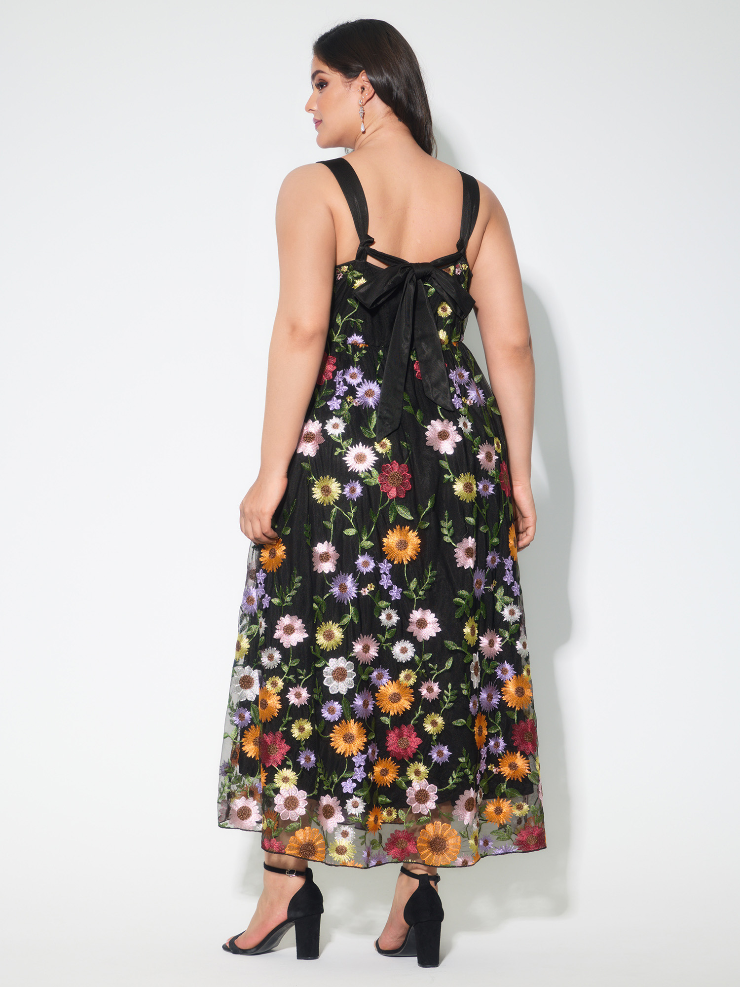 Side view of BloomChic Women's Plus Size Pretty Florals Embroidered Mesh Maxi Dress Black Party Maxi Embroidered Square Neck 28/5X