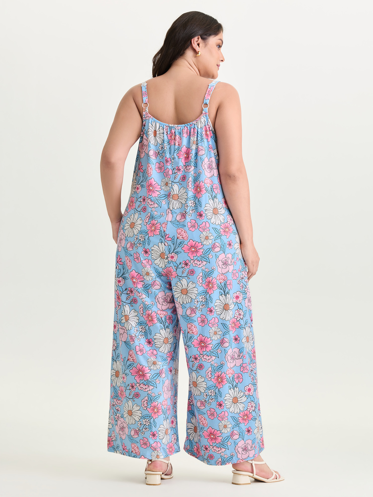 Side view of BloomChic Women's Plus Size Stretchy Floral Print Wide Straps Jumpsuit LightBlue Casual 30/6X