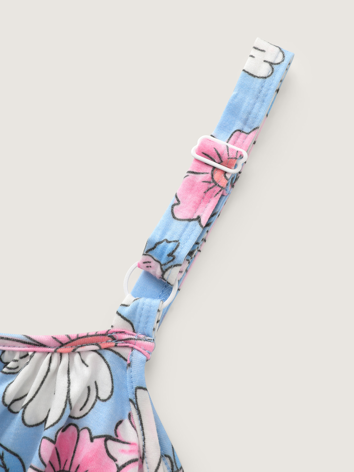 Side view of BloomChic Women's Plus Size Stretchy Floral Print Wide Straps Jumpsuit LightBlue Casual 30/6X