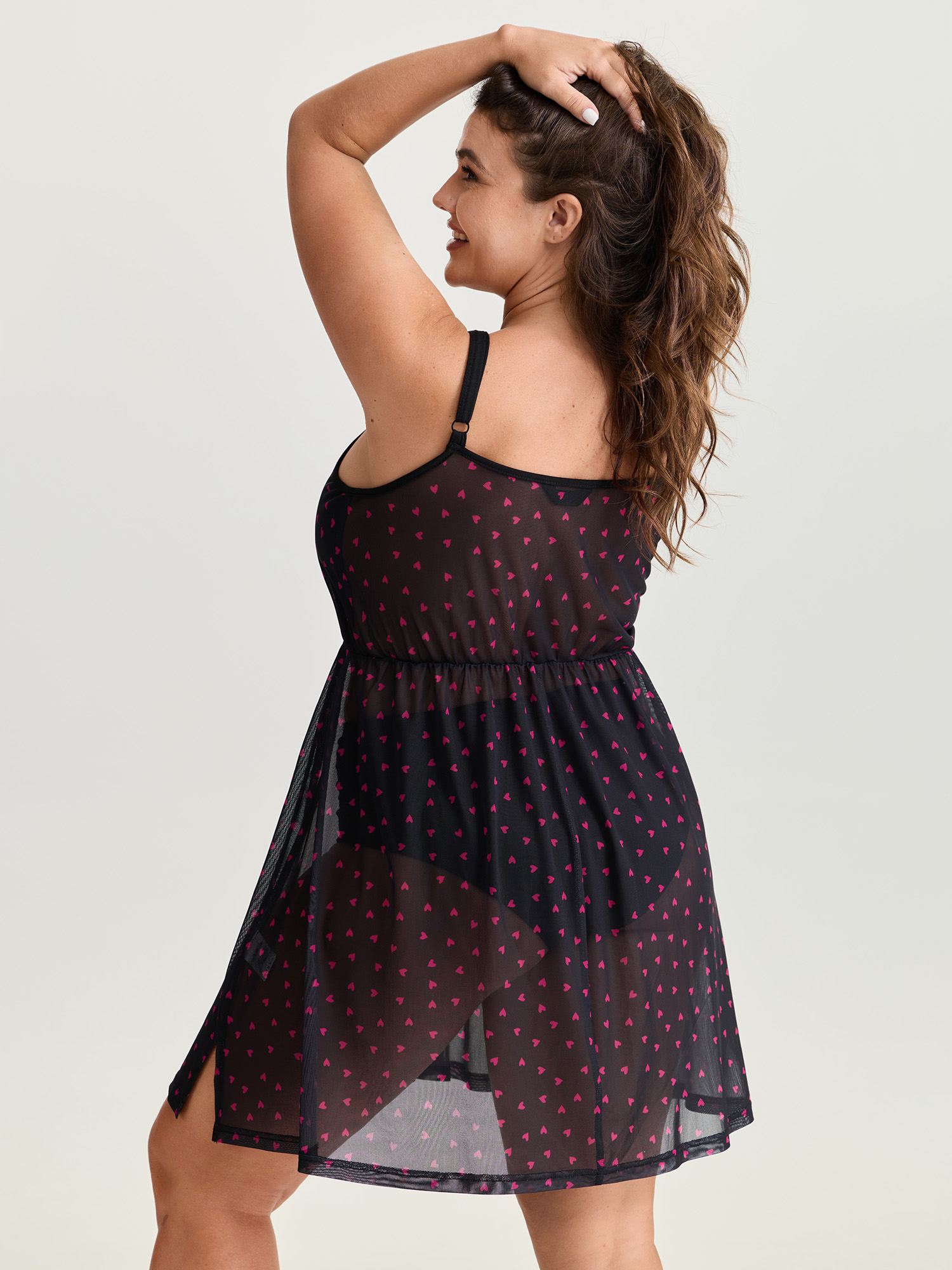 Side view of BloomChic Women's Plus Size Sweetheart Print Sheer Crisscross Neckline Nightgown Black Sleeveless Tunic 12/L
