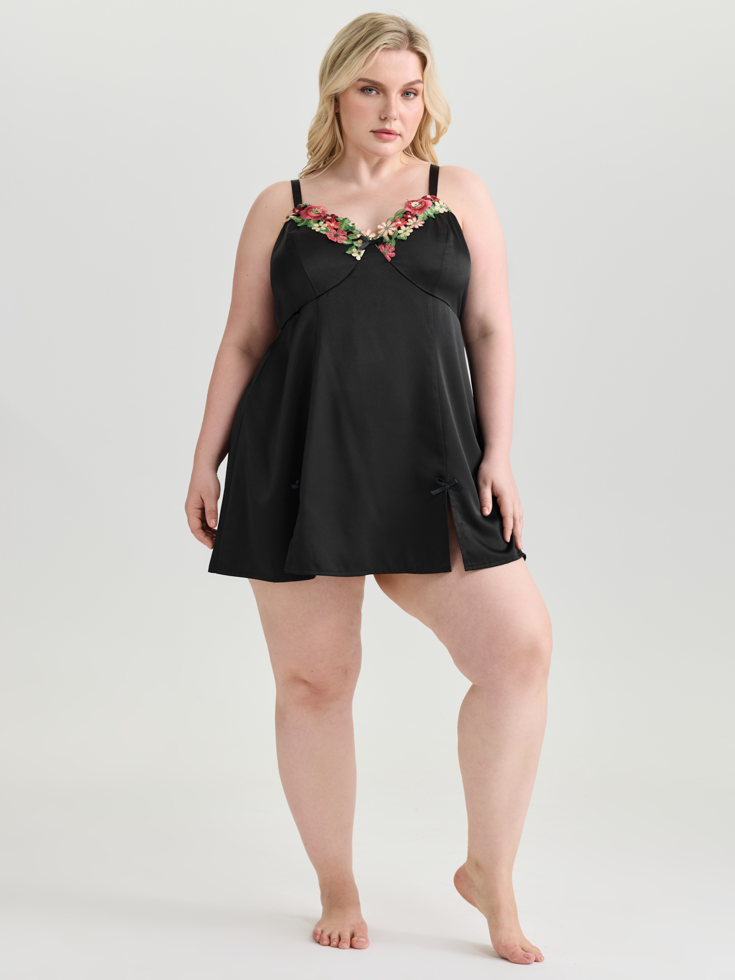 Side view of BloomChic Women's Plus Size Floral Embroidered Satin Bustier Nightgown Black Sleeveless Tunic 14-16/1X