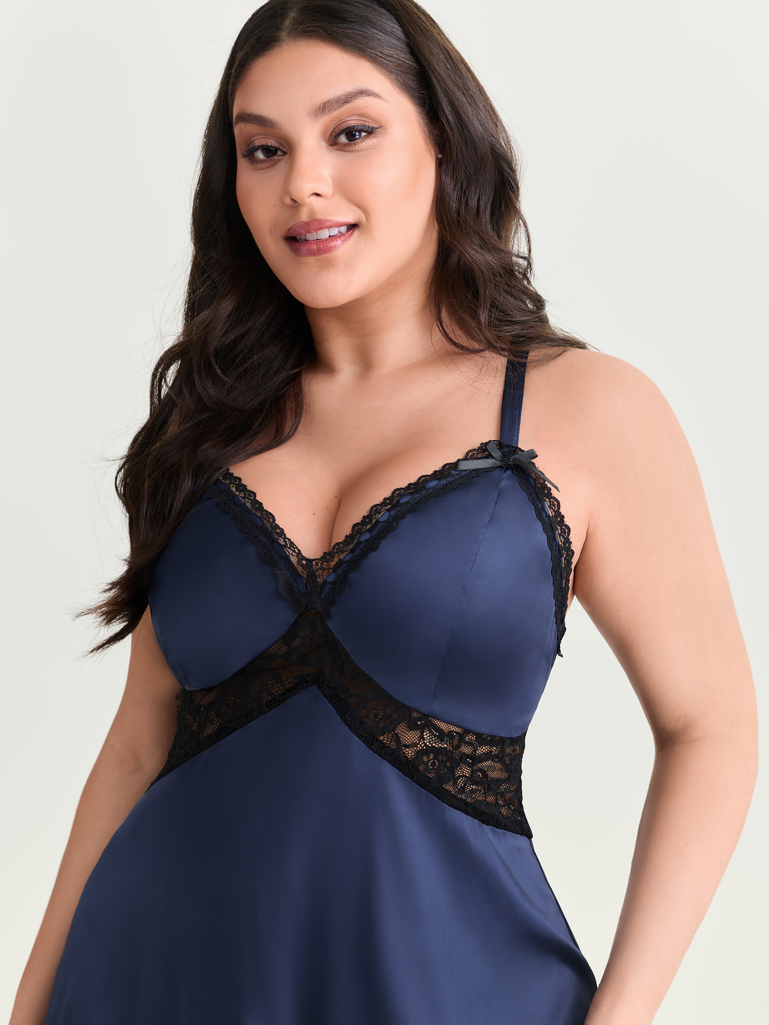 Side view of BloomChic Women's Plus Size Satin Lace Trim Plunging Neckline Nightgown Indigo Sleeveless cropped V-Neck 12/L