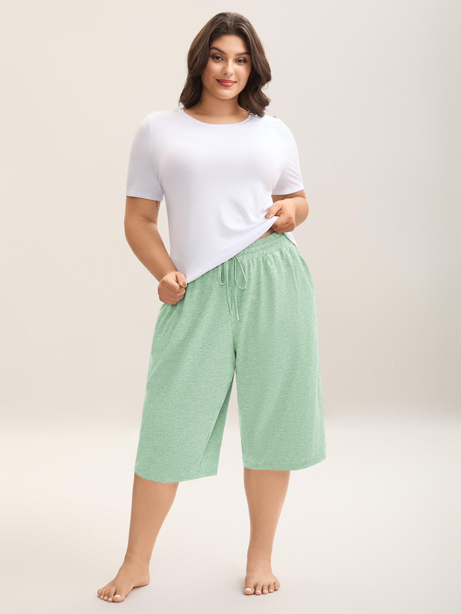 Side view of BloomChic Women's Plus Size Mixed Color Knit Drawstring Loungewear Bottoms Mint Knee Length 14-16/1X