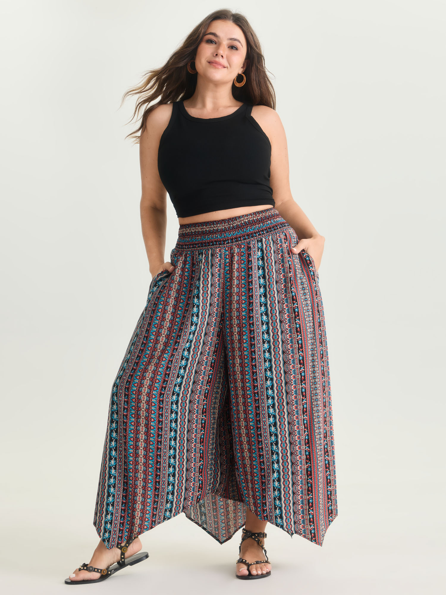 BloomChic Women's Plus Size Shirred Colorful Asymmetric Hem Pants BlackFlower Ethnic Floral Flared High Rise 10/M